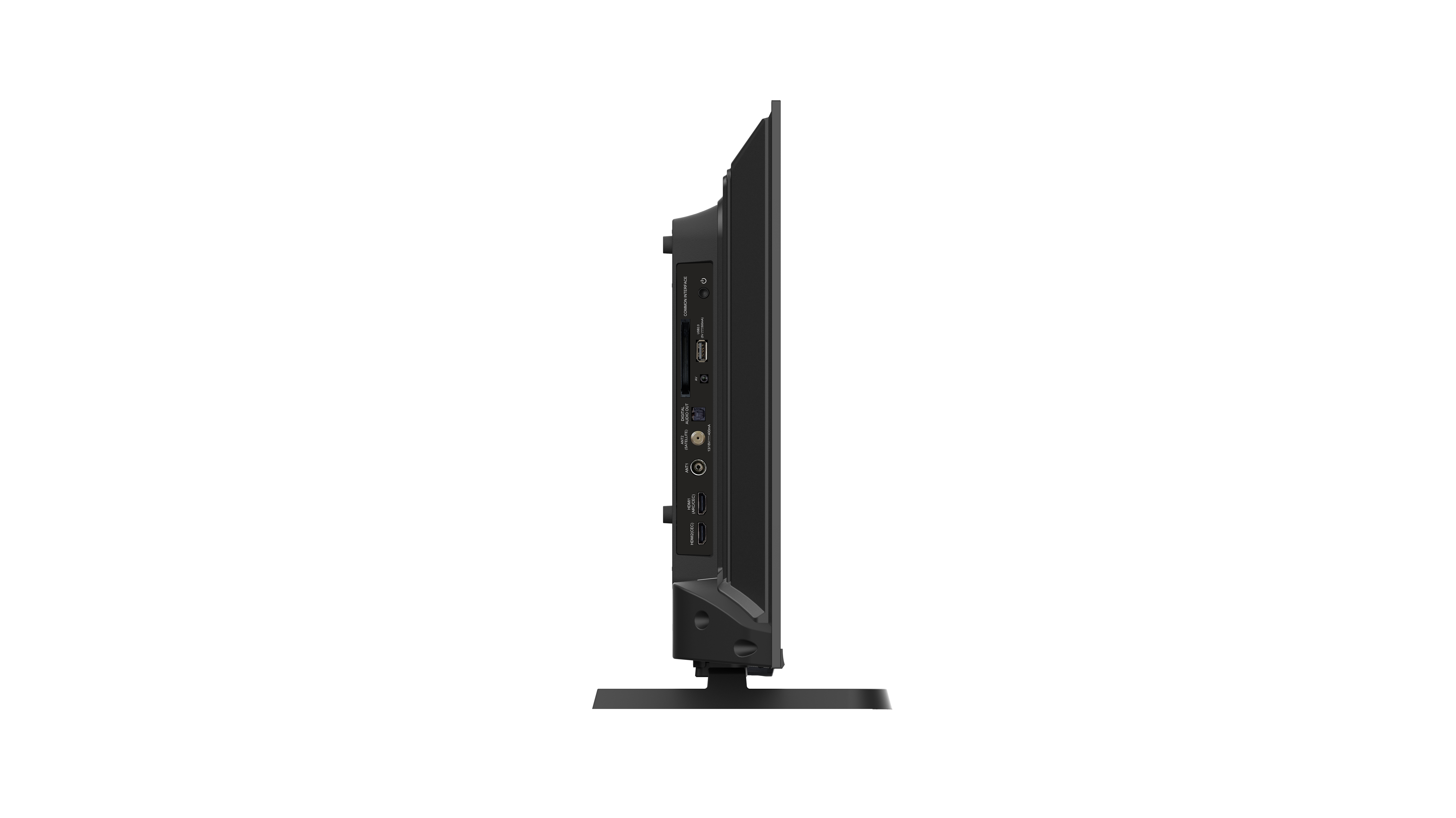 Seitenansicht eines schwarzen Fernsehers mit Ständer auf weißem Hintergrund.