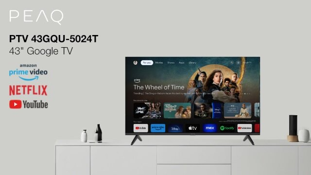 PEAQ TV Google de 43". Pantalla muestra "The Wheel of Time" y apps de streaming.