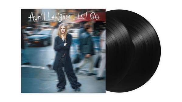 Avril Lavigne albumborítója a képével, két fekete bakelit lemez jobbra.