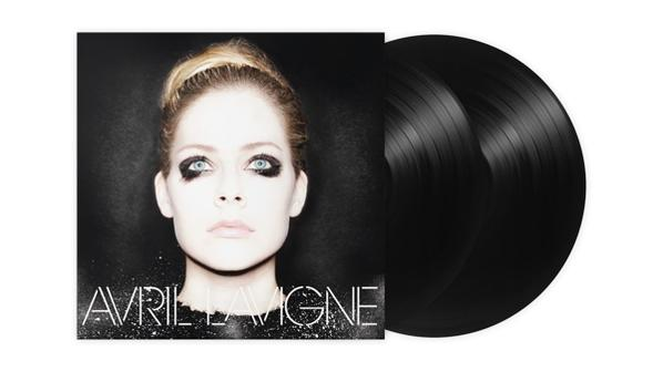 Avril Lavigne album borítója az arcával, két fekete bakelit lemez látható.