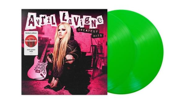 Avril Lavigne album borítója zöld bakelit lemezekkel, gitárral és rózsaszín háttérrel.