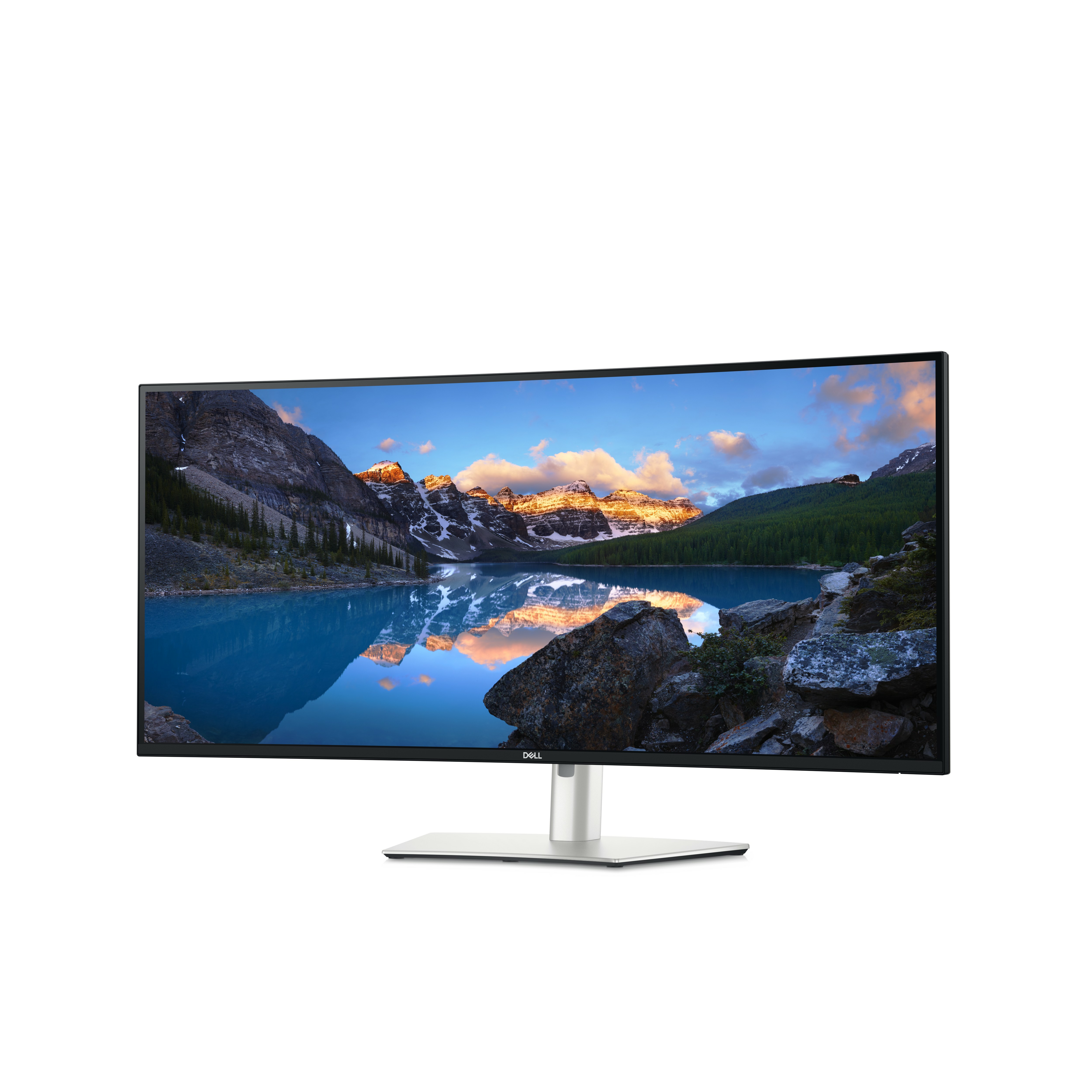 Ein Dell-Monitor zeigt eine Berglandschaft mit einem See und Wolken.