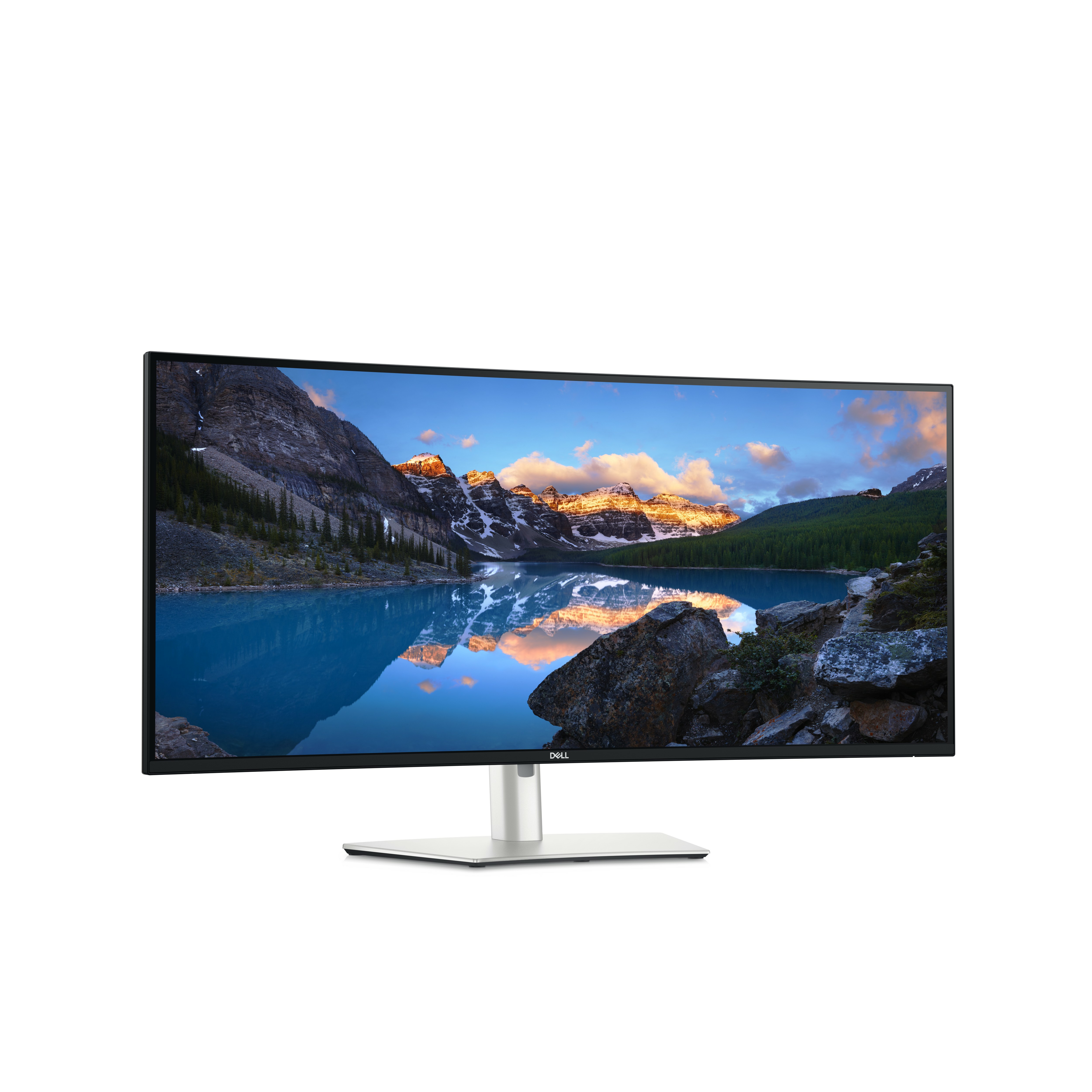 Ein Dell Monitor zeigt eine Berglandschaft mit See und reflektierenden Bergen.
