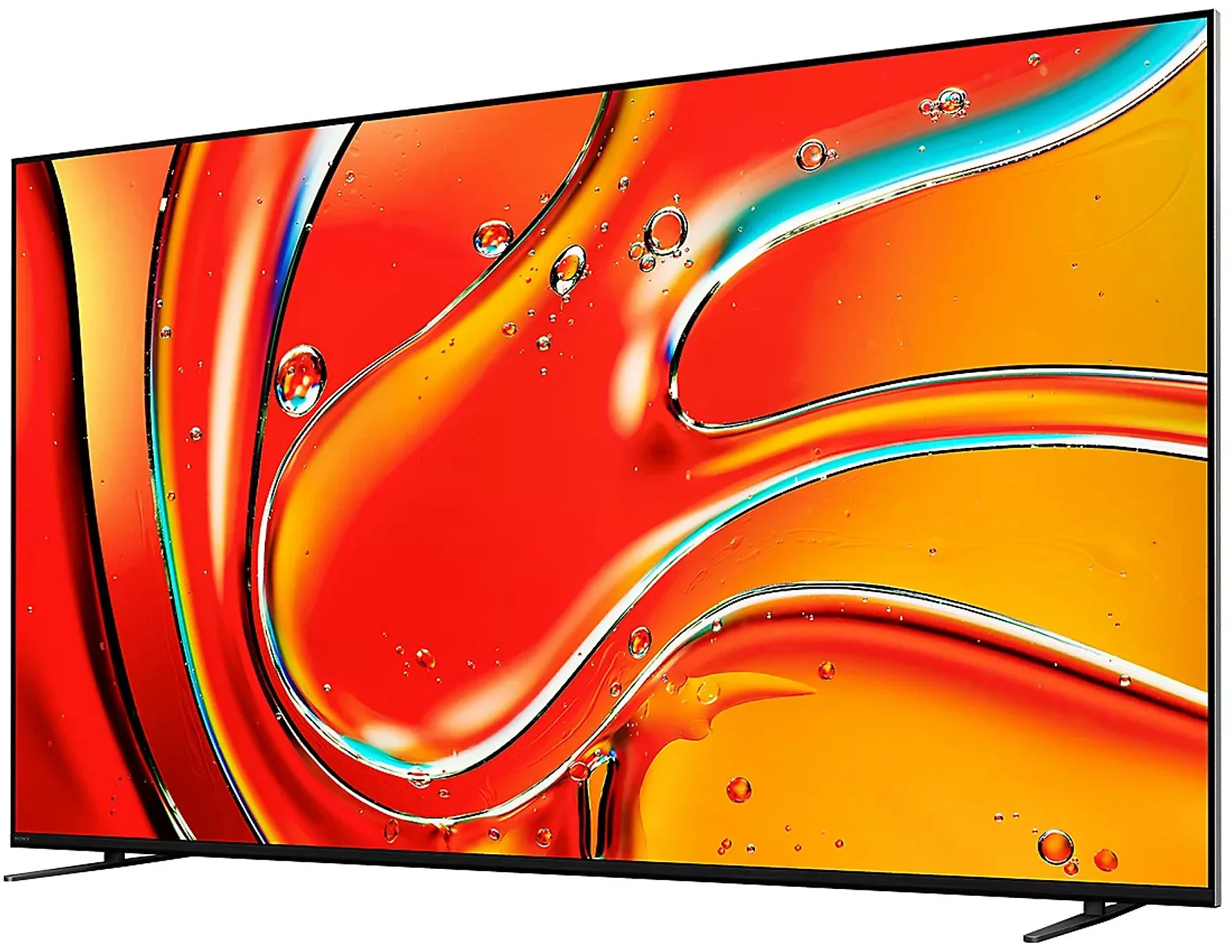 Duży telewizor z abstrakcyjnym tłem w kolorach czerwonym, żółtym i pomarańczowym.