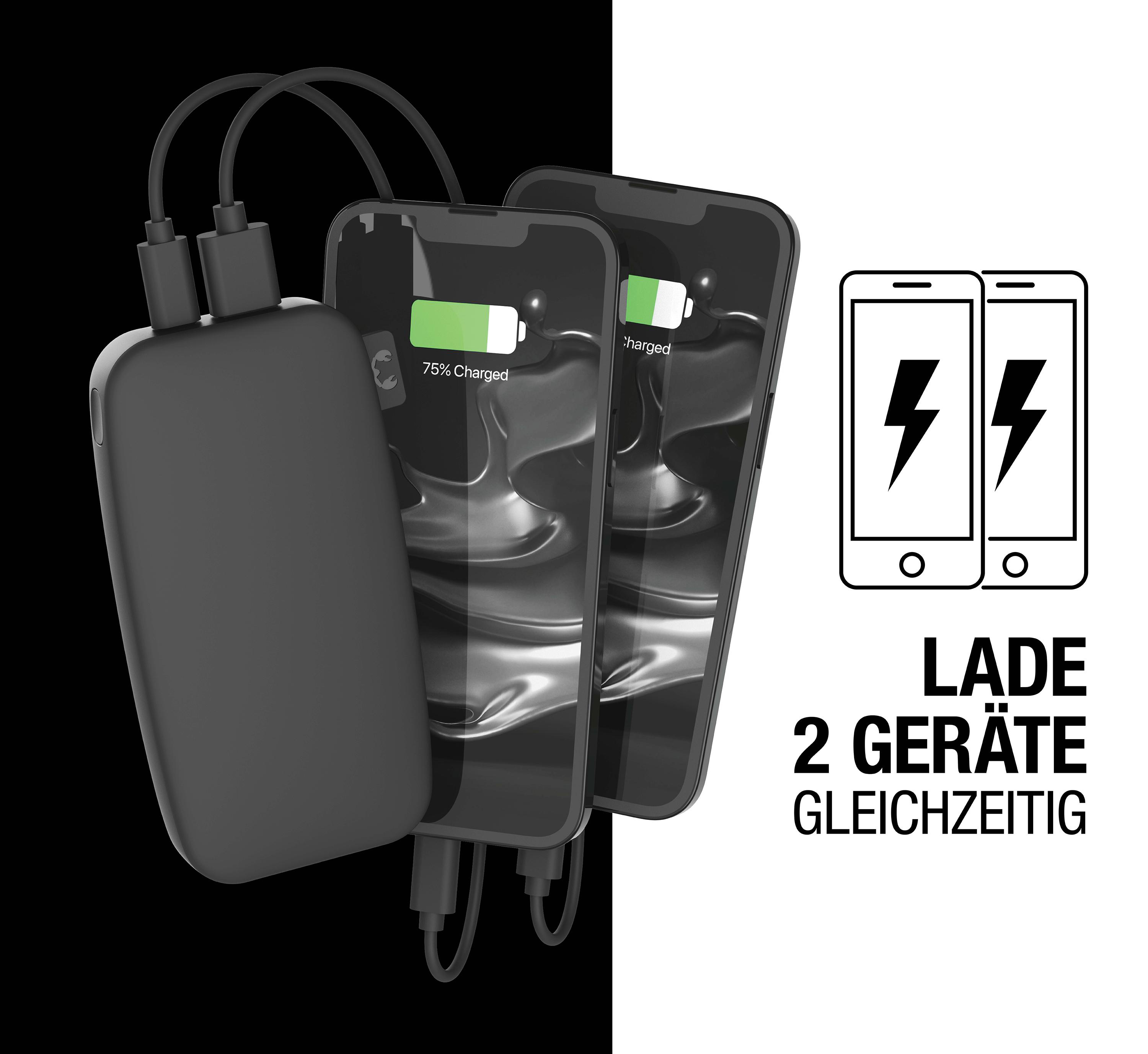 Powerbank lädt zwei Telefone gleichzeitig. Zwei Telefone sind mit der Powerbank verbunden.