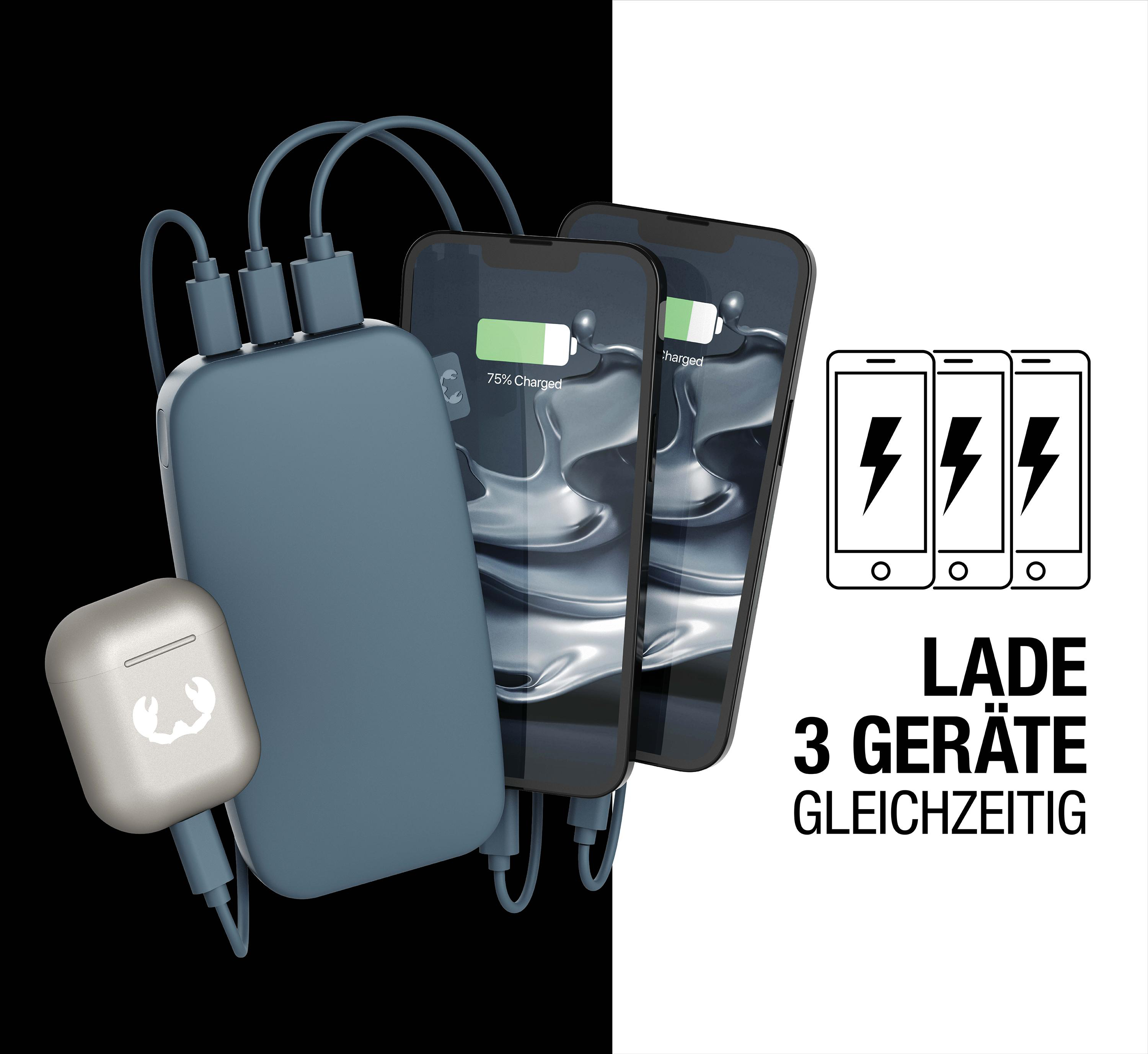 Eine Powerbank, die drei Telefone und ein Paar kabellose Ohrhörer auflädt.