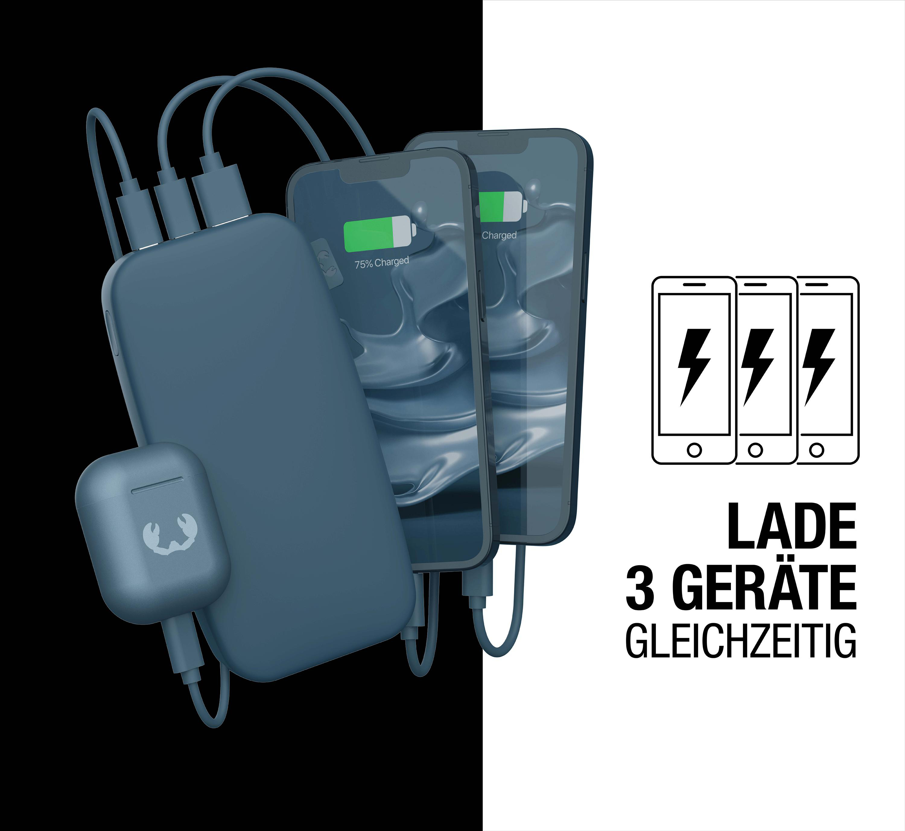 Powerbank mit drei ladenden Telefonen. Text: Lade 3 Geräte gleichzeitig. Schwarz-Weiß-Hintergrund.