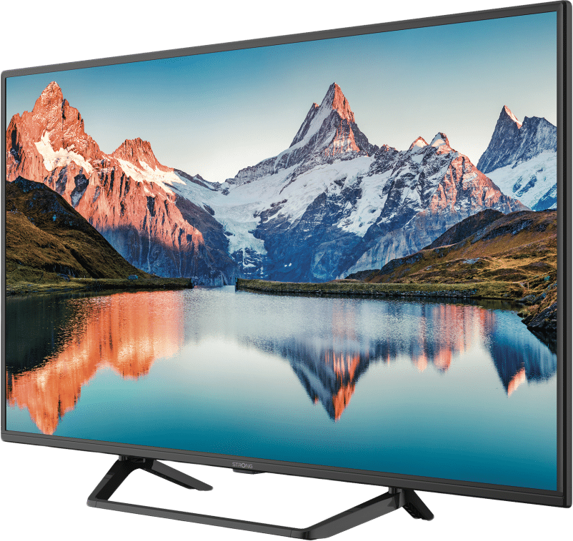 Ein Fernseher zeigt eine malerische Aussicht auf Berge und einen See. Der Fernseher hat einen schwarzen Rahmen.