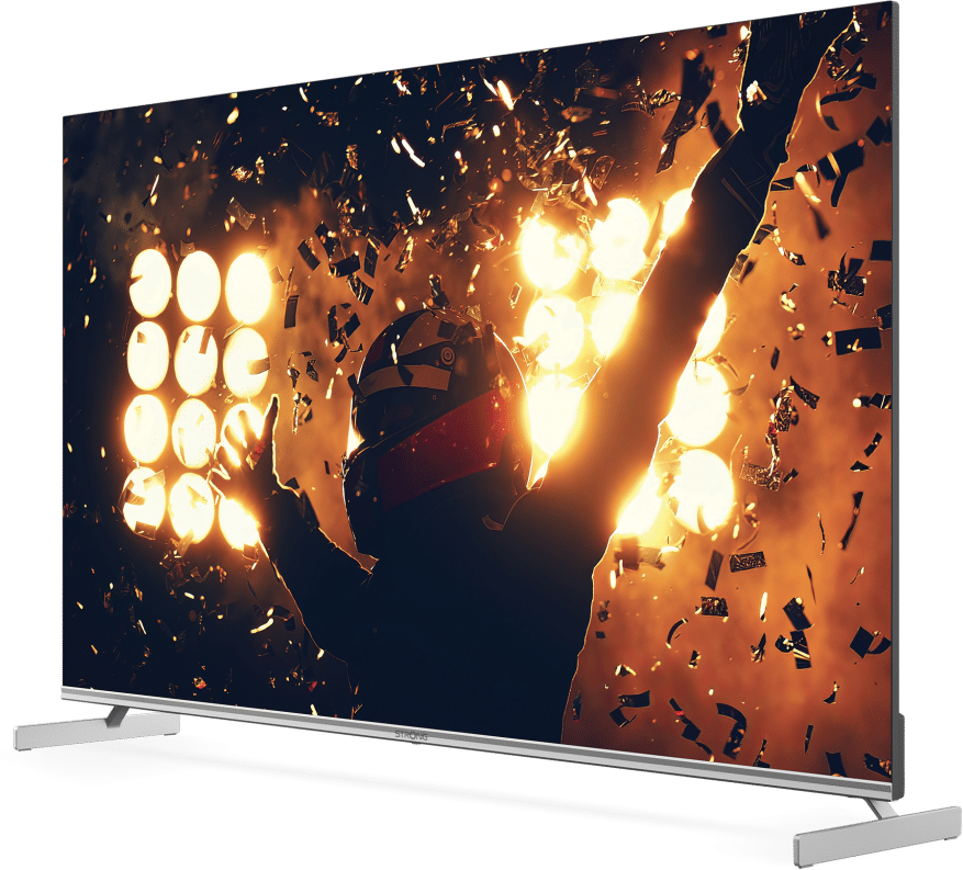 Ein Breitbild-TV, das einen Mann beim Feiern zeigt, mit Konfetti und hellem Licht.