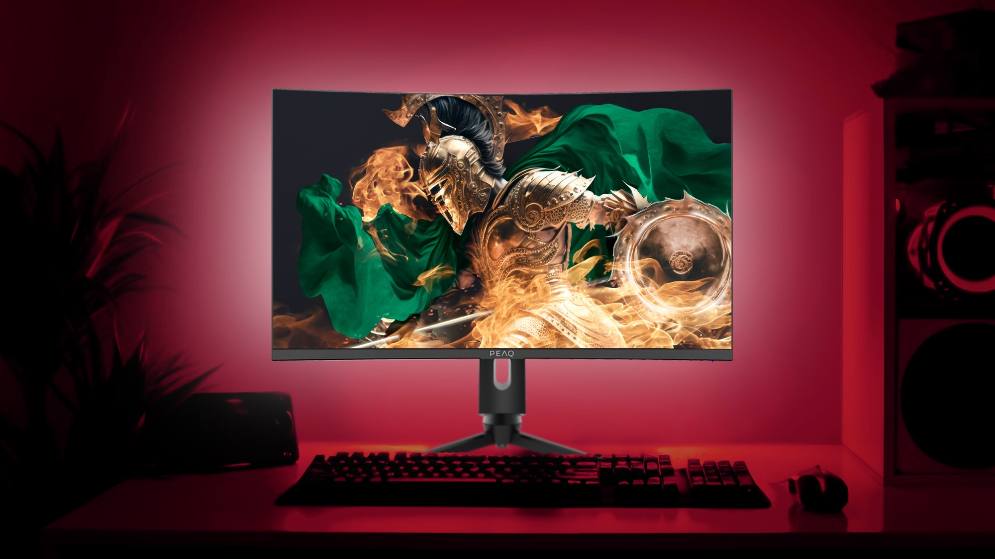 Zakrzywiony monitor do gier z grafiką wojownika. Czerwone i czarne biurko z klawiaturą i myszą. Czerwone oświetlenie.
