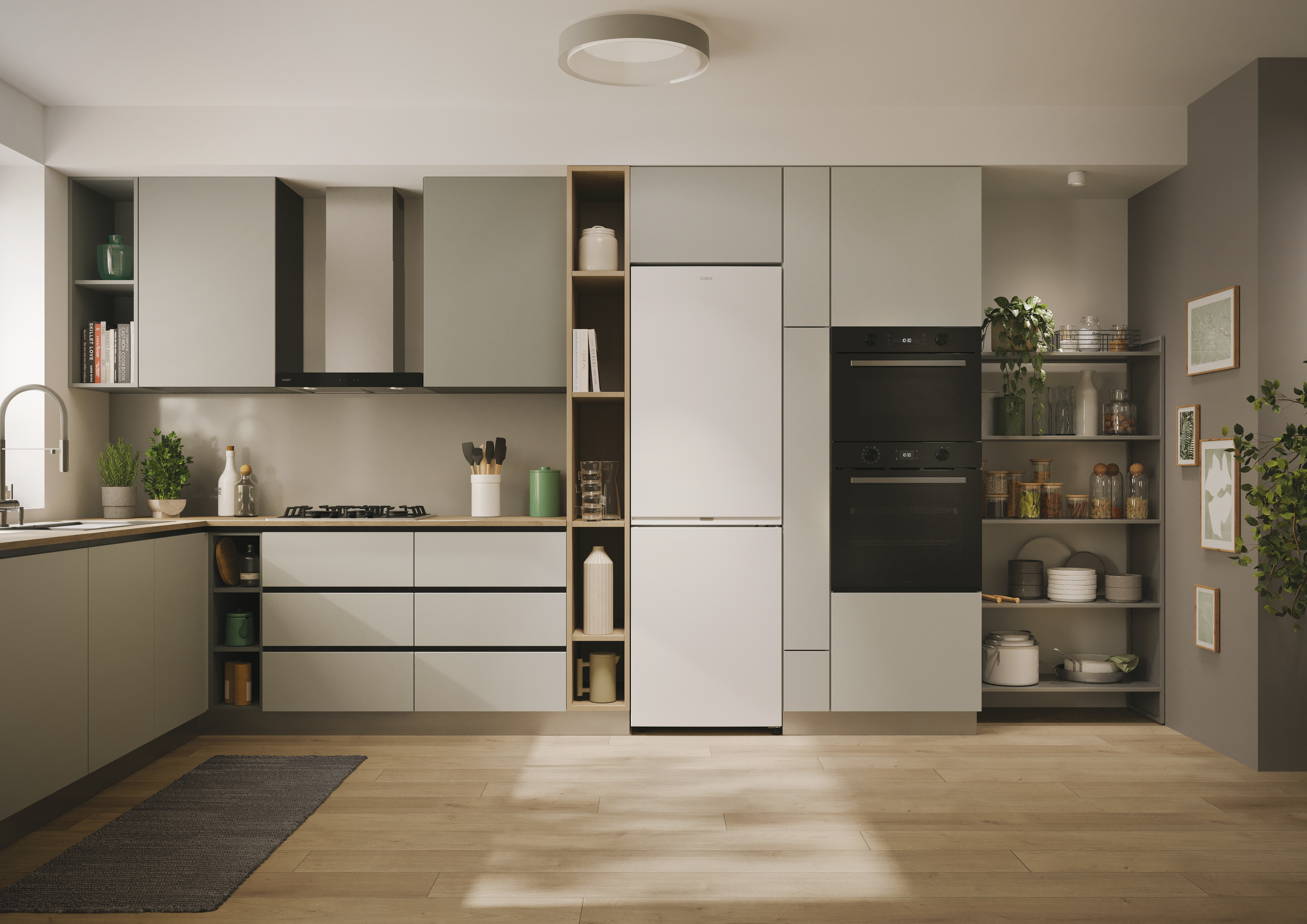 Cocina moderna con gabinetes grises, refrigerador, horno y estantes con plantas.