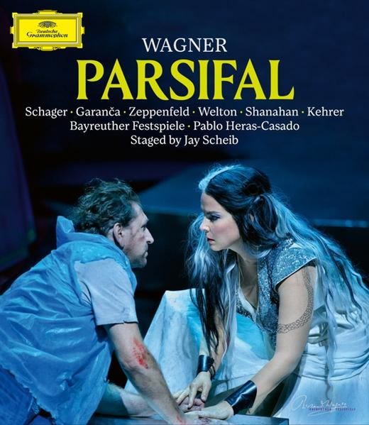 Opernplakat: Wagners Parsifal. Zeigt eine dramatische Szene mit zwei Figuren, Text und Logo.