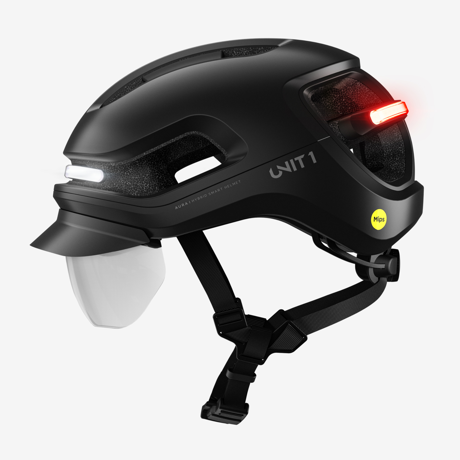Casque intelligent noir avec lumières et visière. La marque est Unit 1, avec un autocollant MIPS jaune.