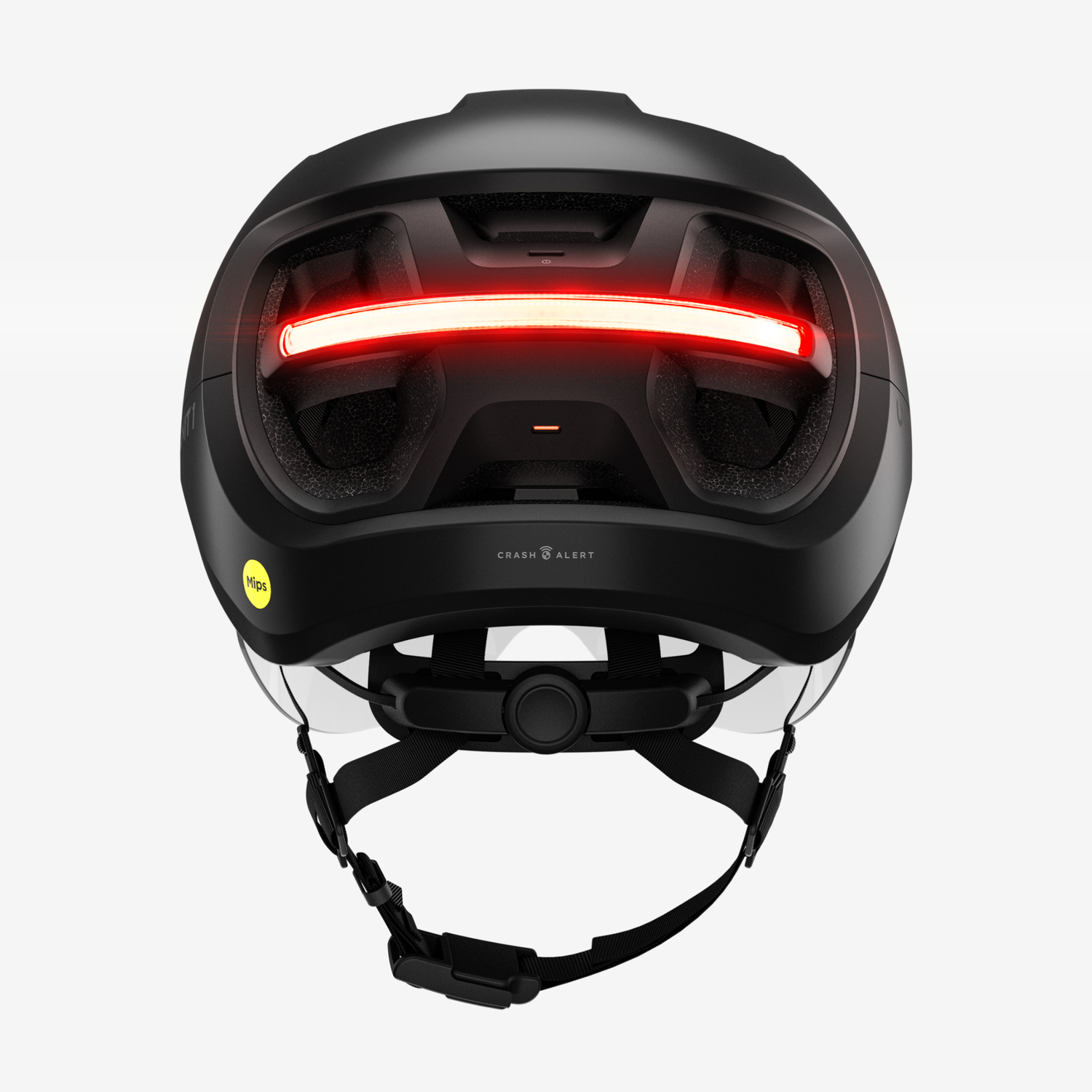 Casque de vélo noir avec une bande lumineuse rouge à l'arrière. Avec un autocollant MIPS jaune et des sangles noires.