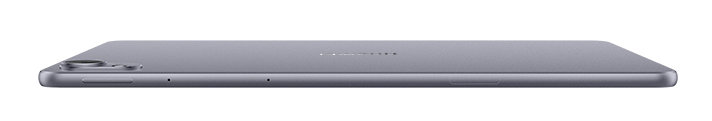Widok z boku szarego tabletu. Tablet jest cienki i ma aparat oraz przyciski z boku.