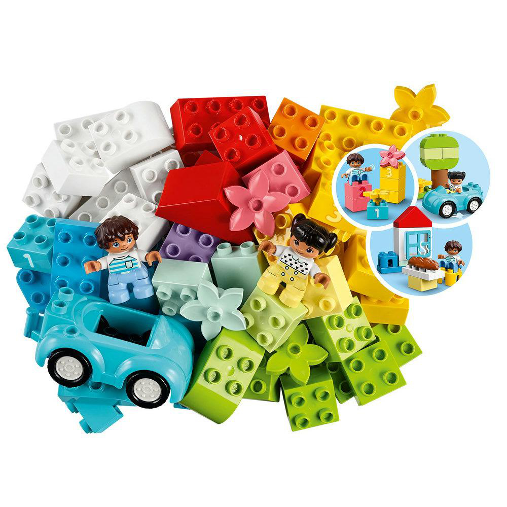 Bunte Duplo-Bausteine mit Figuren, Autos und Häusern. Enthält blaue, rote, grüne und weiße Steine.