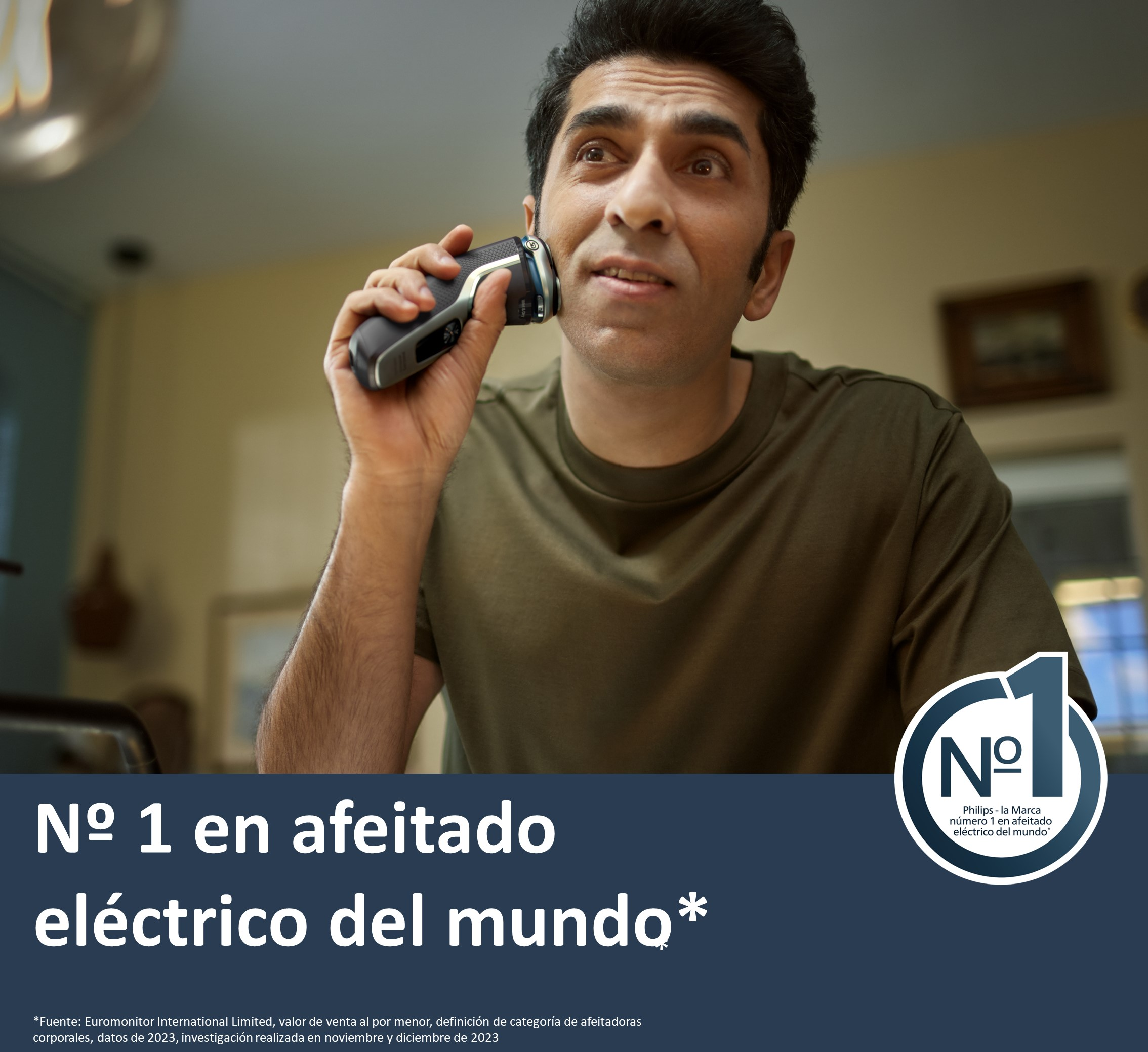 Hombre afeitándose con una afeitadora eléctrica Philips. Texto: 'Nº 1 en afeitado eléctrico'.