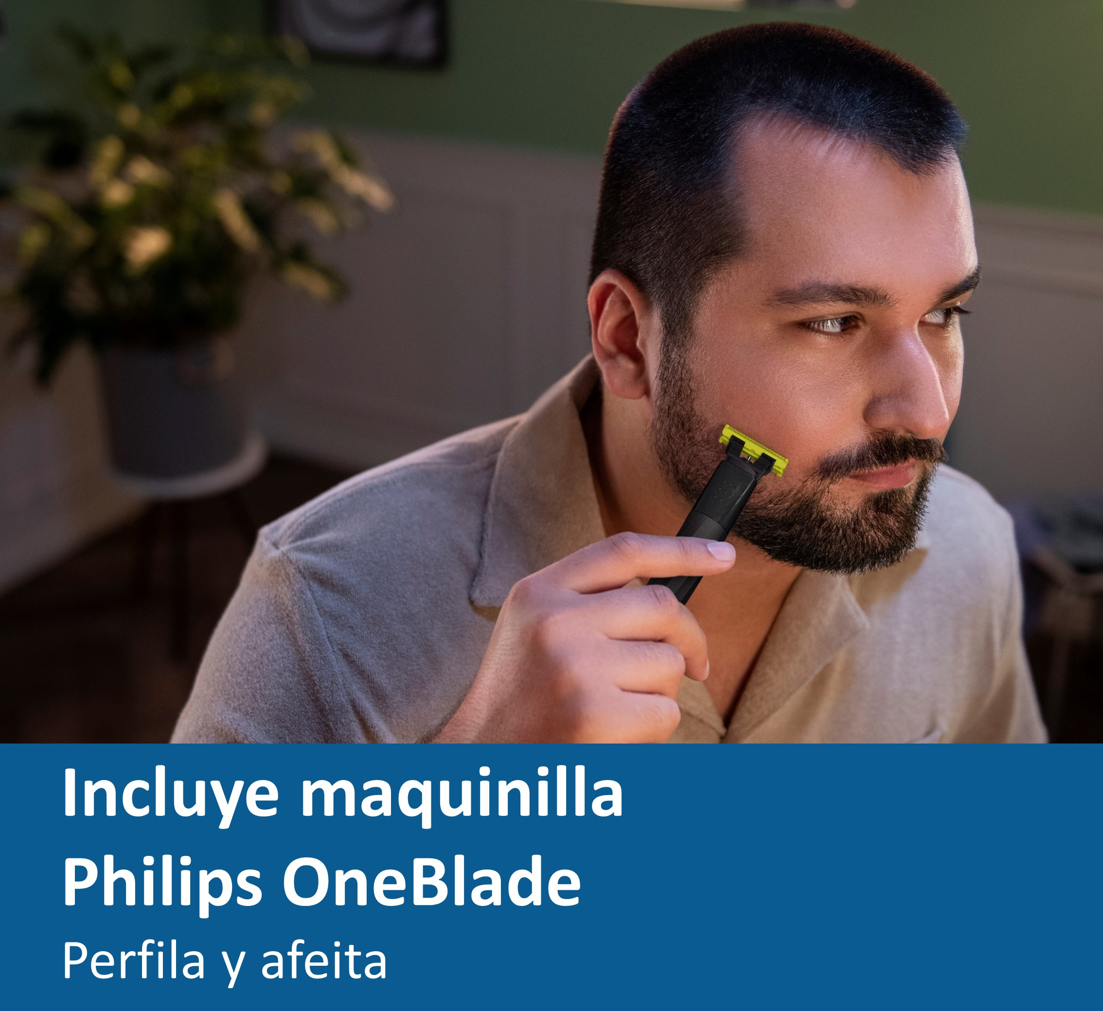 Hombre afeitándose la barba con una afeitadora Philips OneBlade.