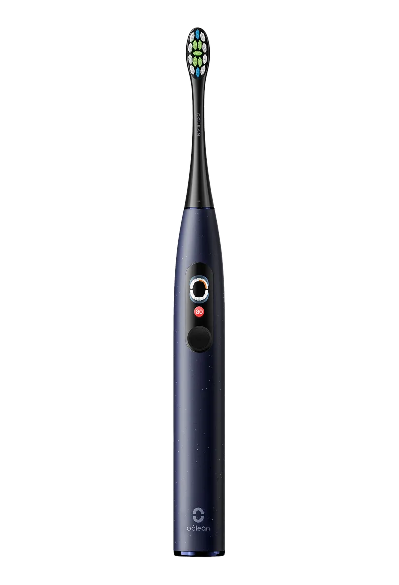 Spazzolino elettrico. Corpo blu scuro con pulsante nero e testina blu.