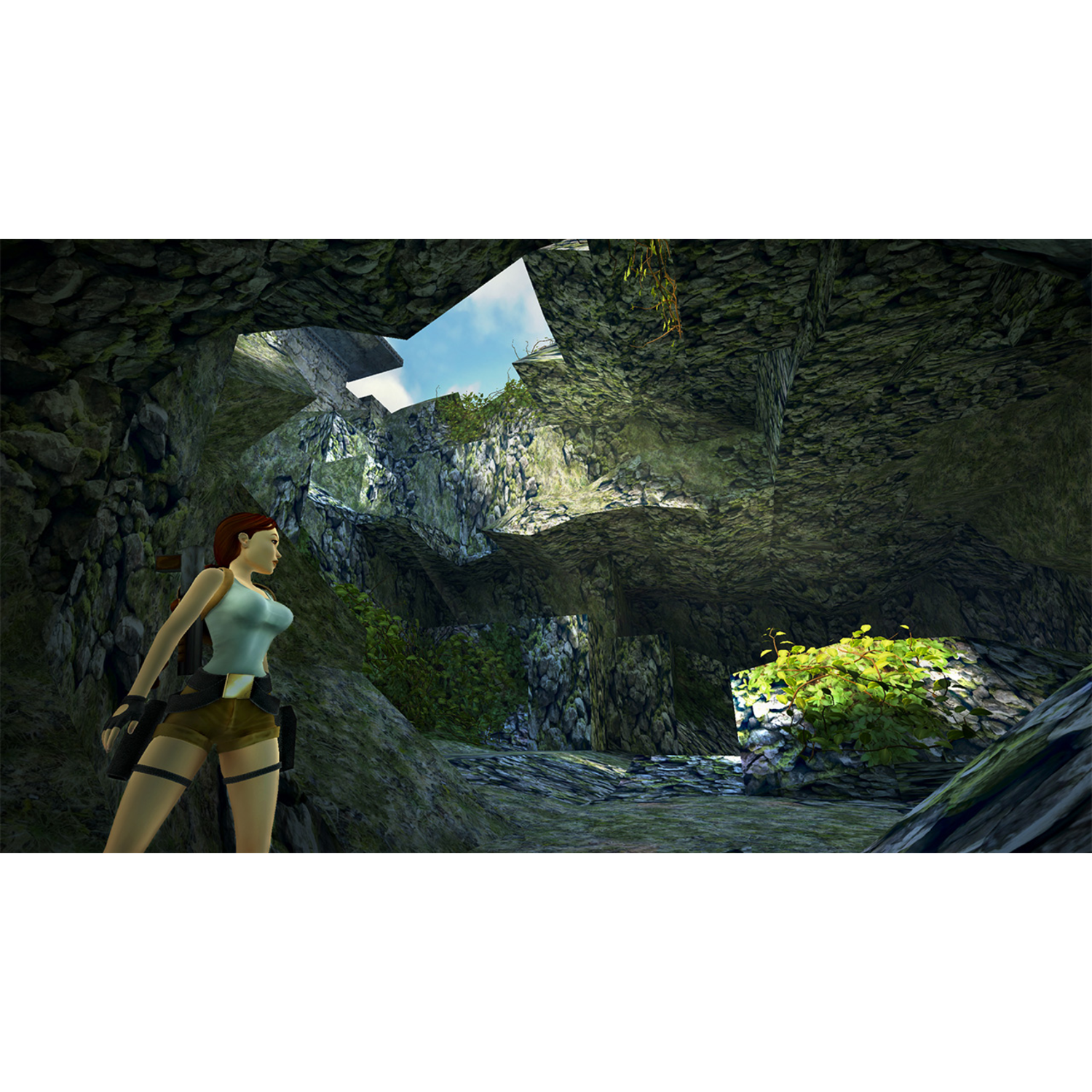 A woman with a tank top and shorts stands in a cave. The scene is brightly lit.