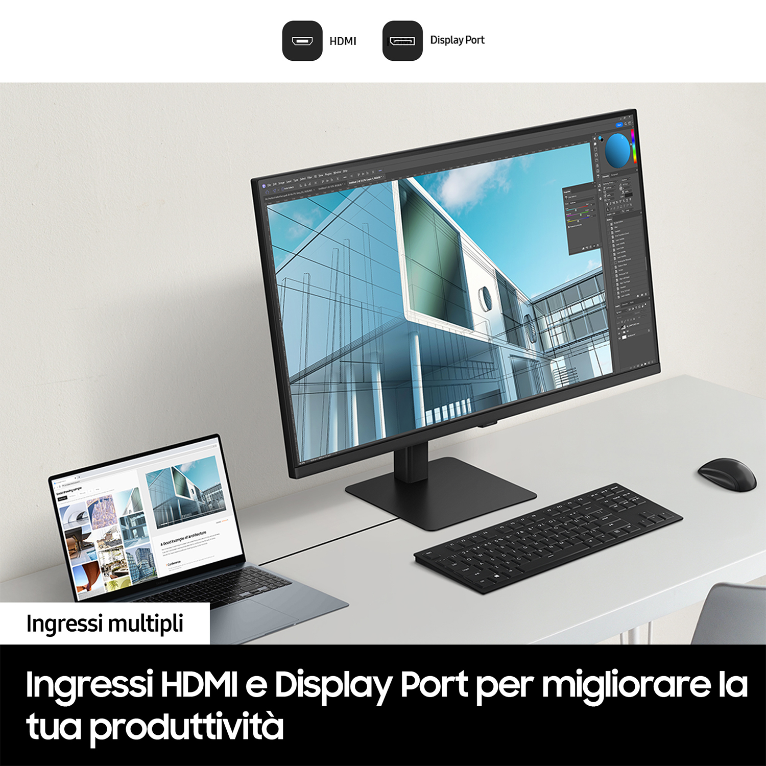 Una scrivania con un laptop, monitor, tastiera e mouse. Il monitor ha un'interfaccia di progettazione grafica.