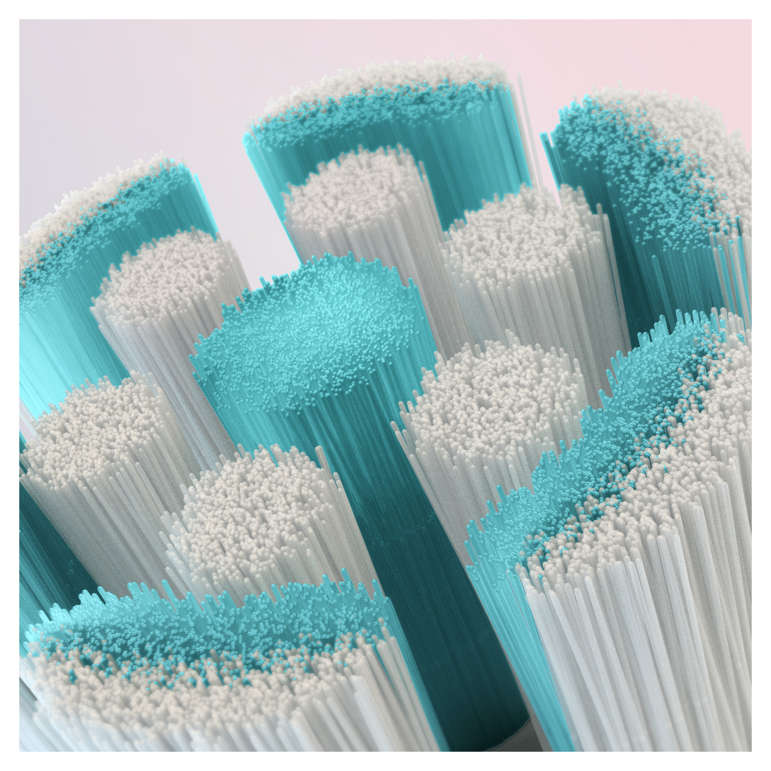 Close-up of toothbrush bristles, with white, teal, and blue colors.