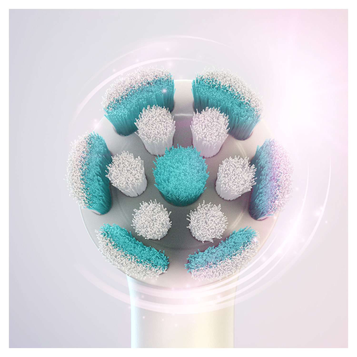 Close-up of toothbrush heads with blue and white bristles, light background.