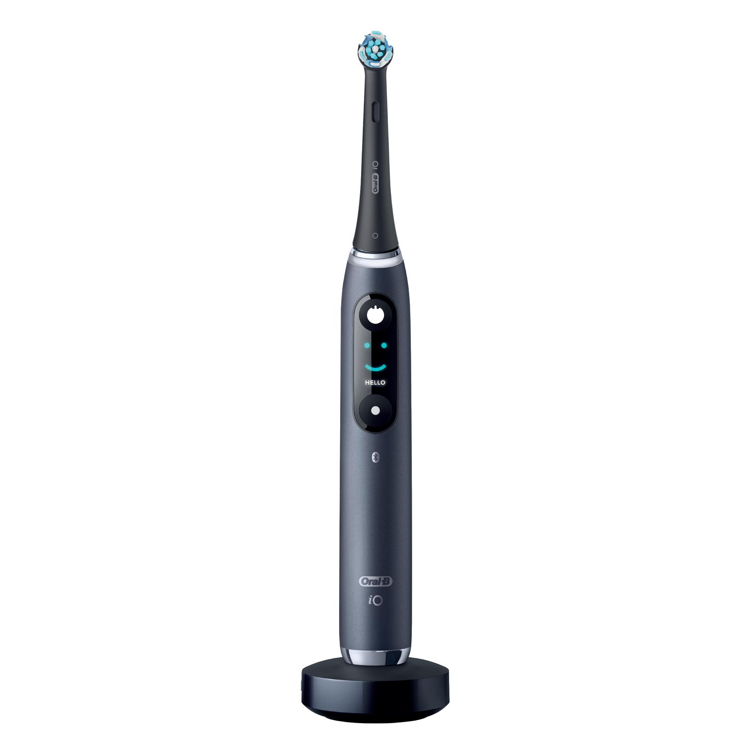 An Oral-B iO 10 electric toothbrush on its charging base, showing a screen and buttons.
