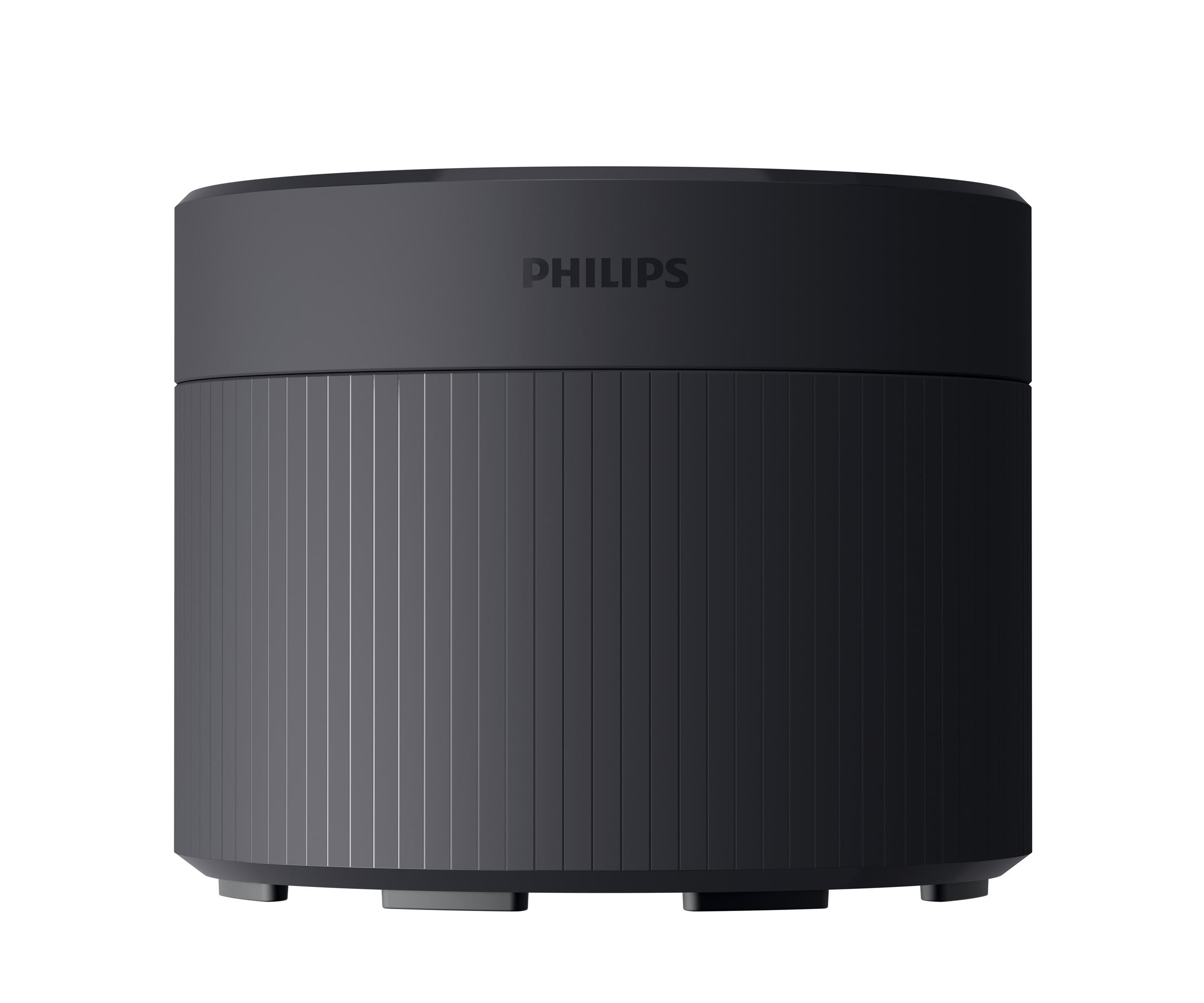 Ein schwarzer zylindrischer Lautsprecher mit der Marke 'PHILIPS' oben.