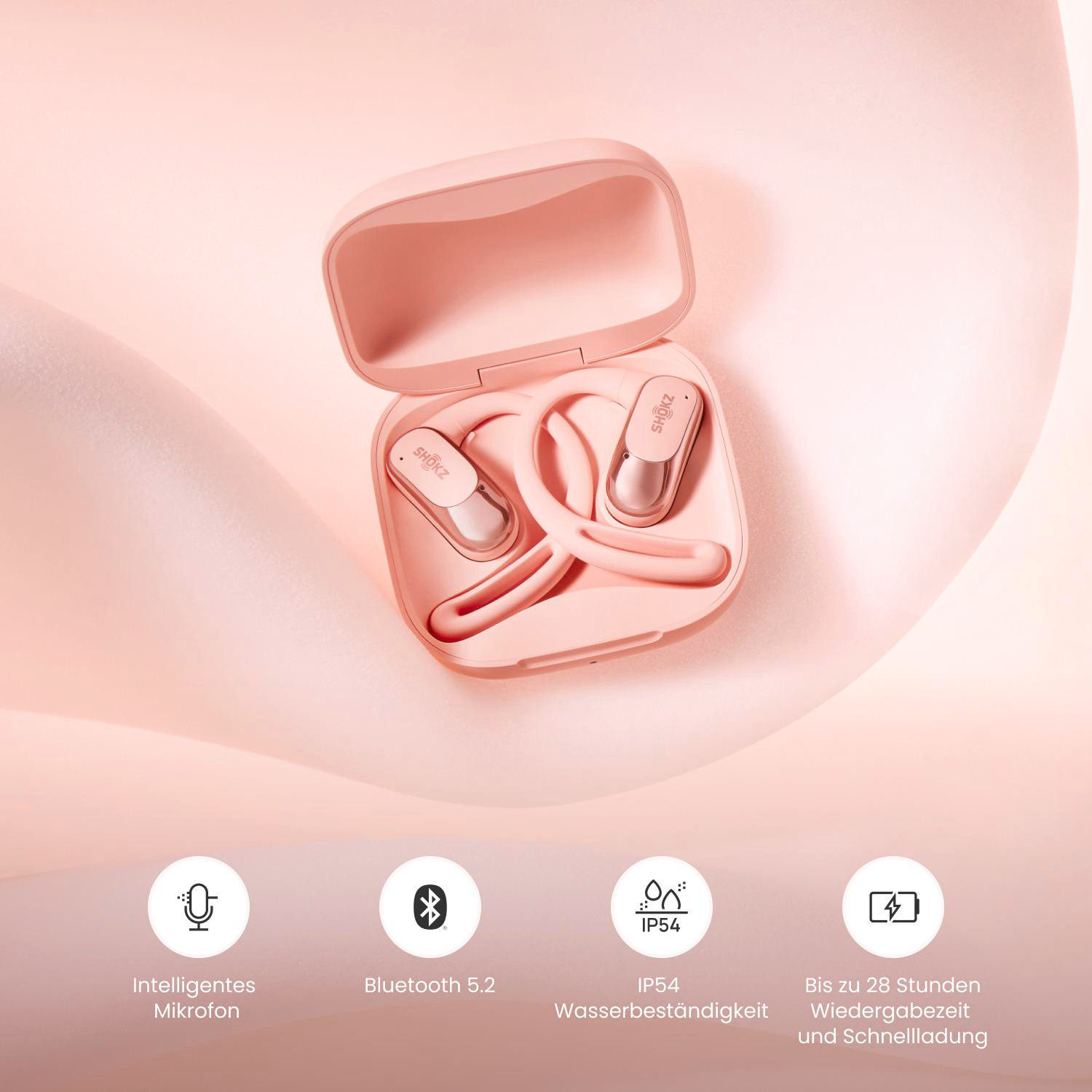Rosa Ohrhörer in einem Etui mit Funktionssymbolen darunter. Das Etui ist geöffnet und zeigt die Ohrhörer. Der Hintergrund ist ein weicher rosa Farbverlauf.