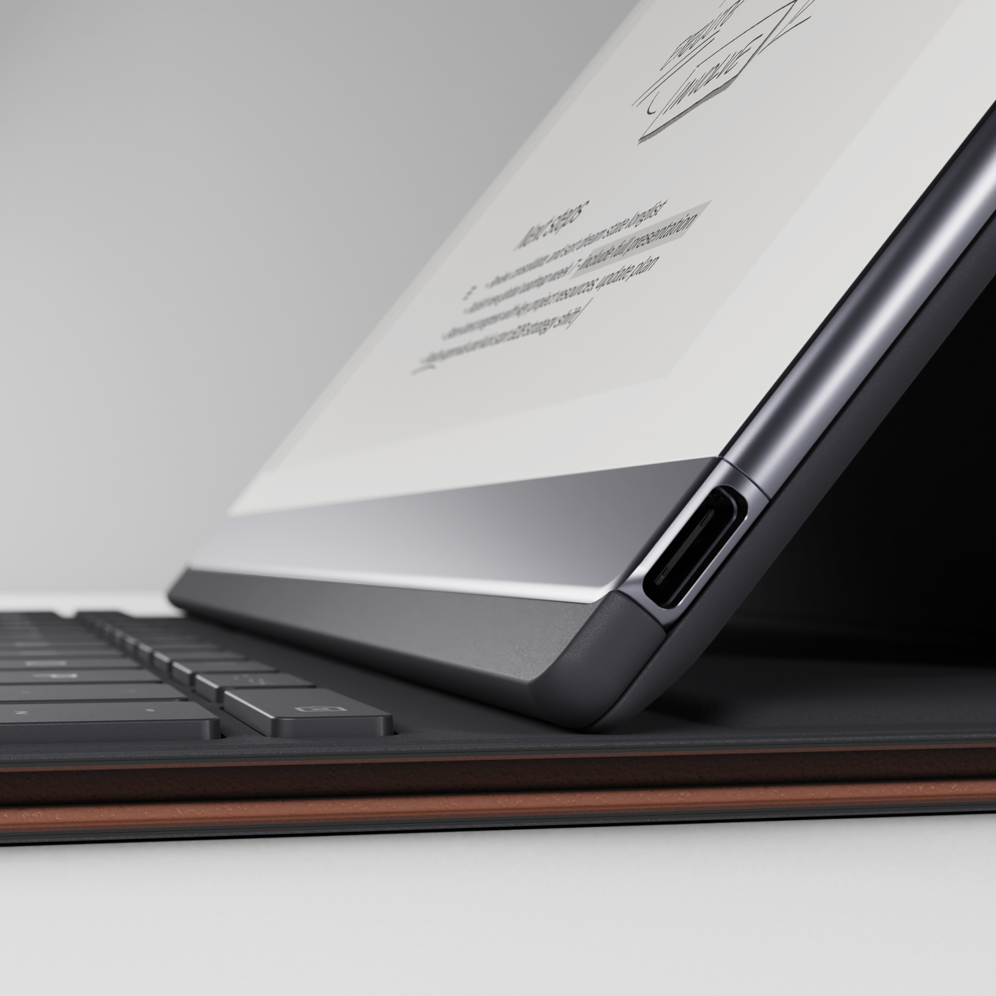 Ein Laptop mit einem Dokument auf dem Bildschirm, Tastatur sichtbar.