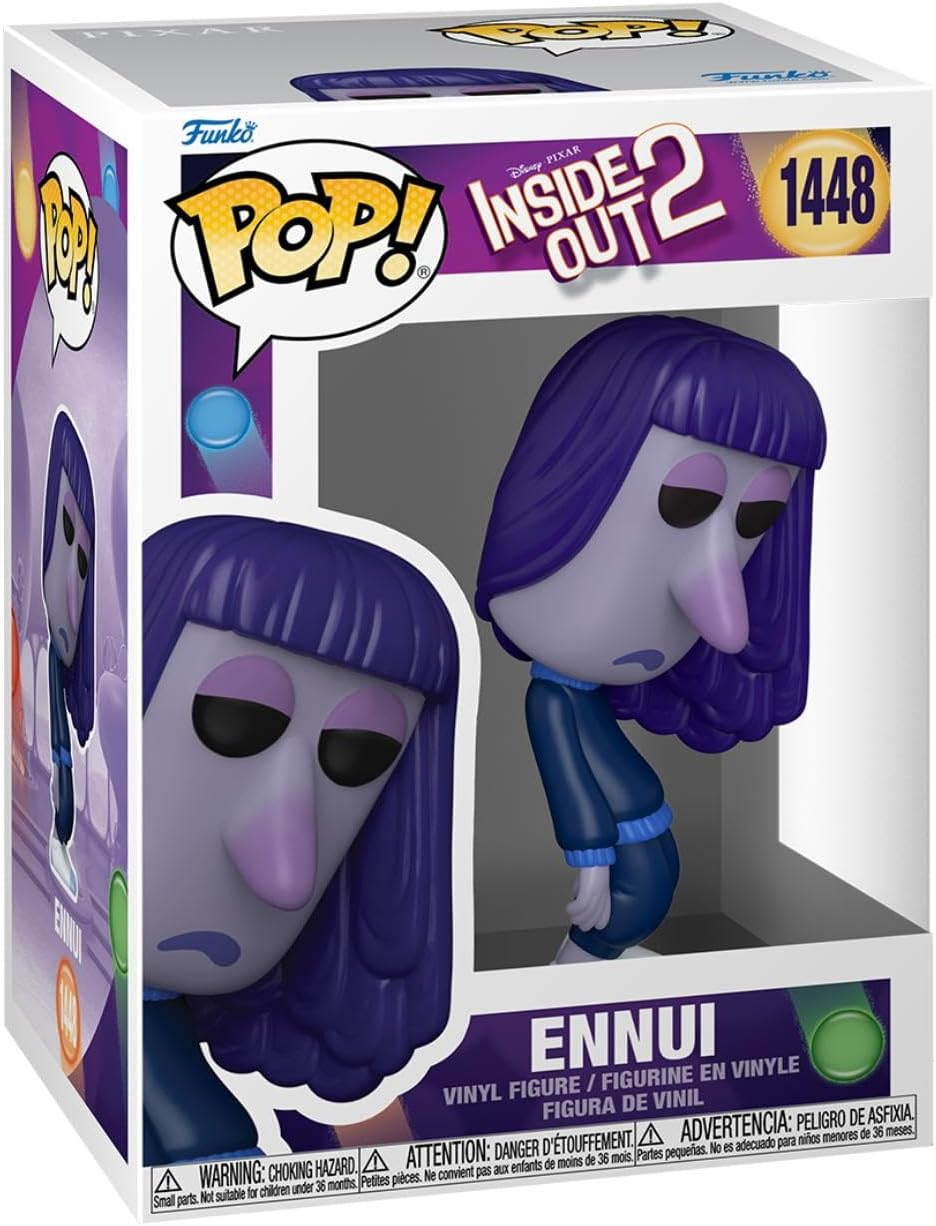 Una figura Funko Pop! de Ennui en una caja. La figura tiene cabello morado, camisa azul y expresión triste.