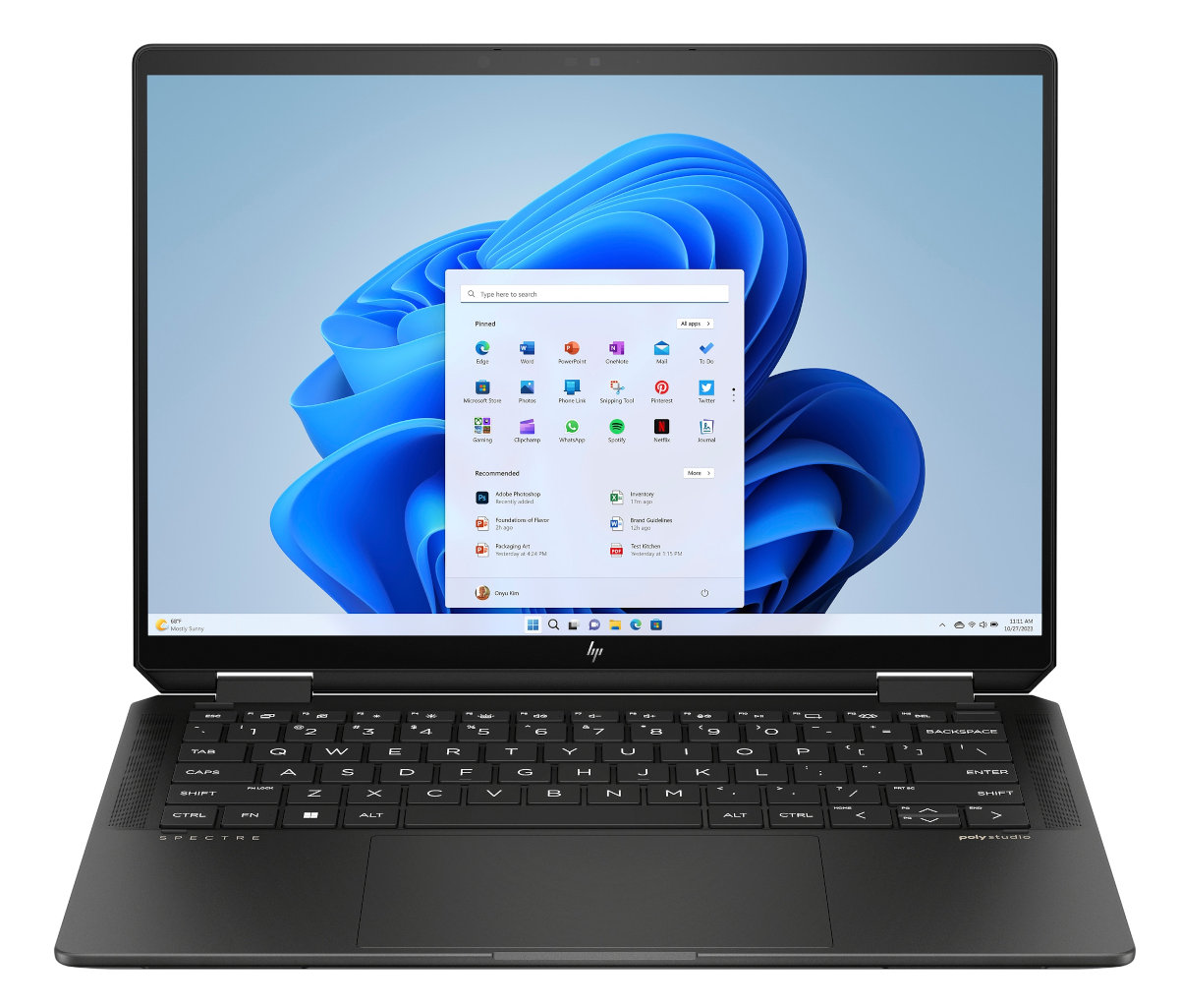 Czarny laptop wyświetla menu start na ekranie. Klawiatura jest widoczna. Tło jest białe.