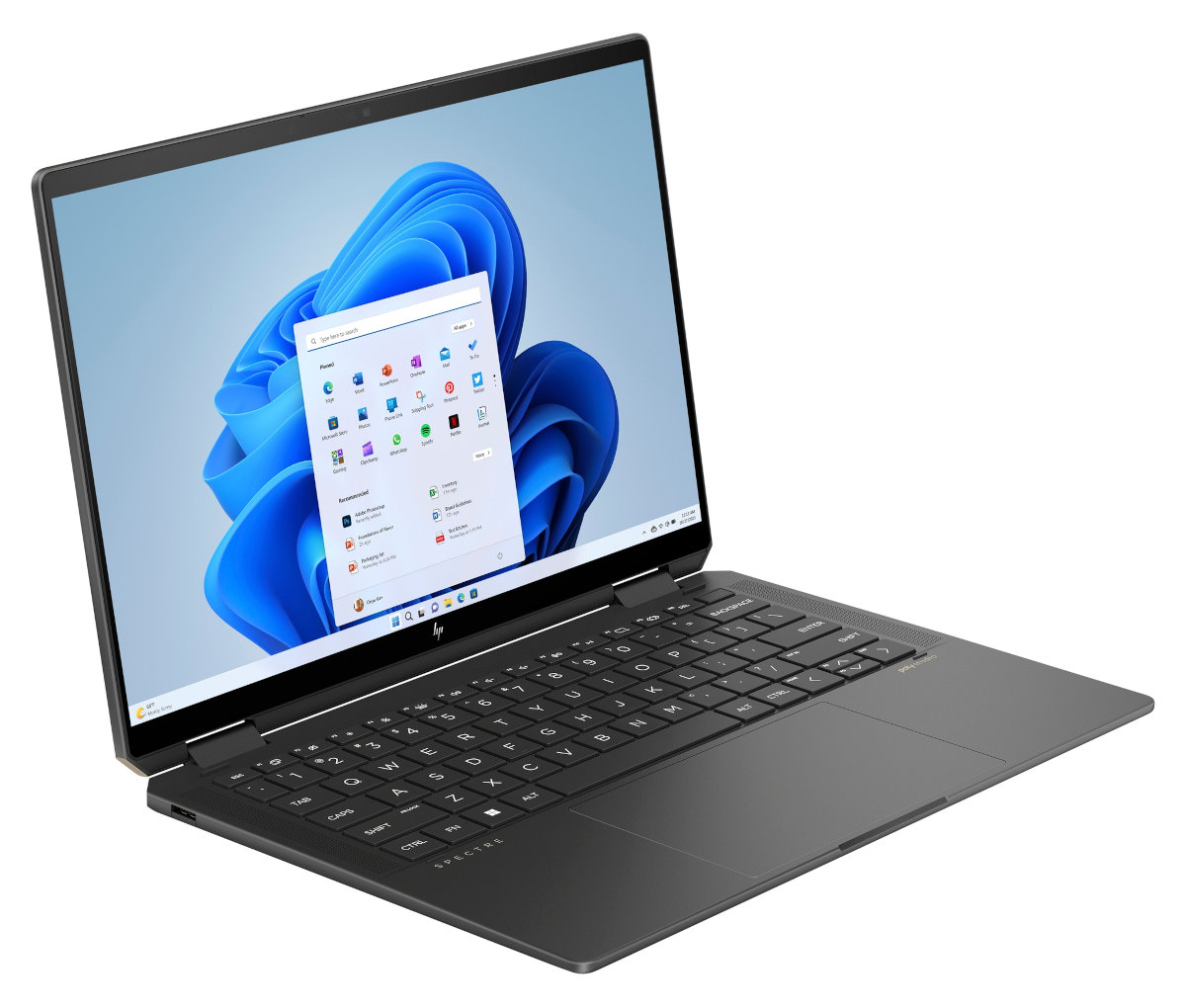 Czarny laptop z niebiesko-białym tłem pulpitu, otwarty na białej powierzchni.