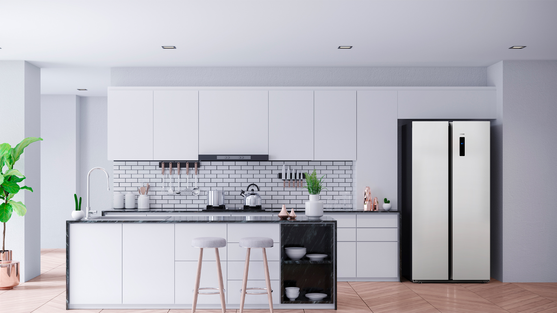 Cocina moderna con armarios blancos, isla y frigorífico. Suelo de madera, planta.