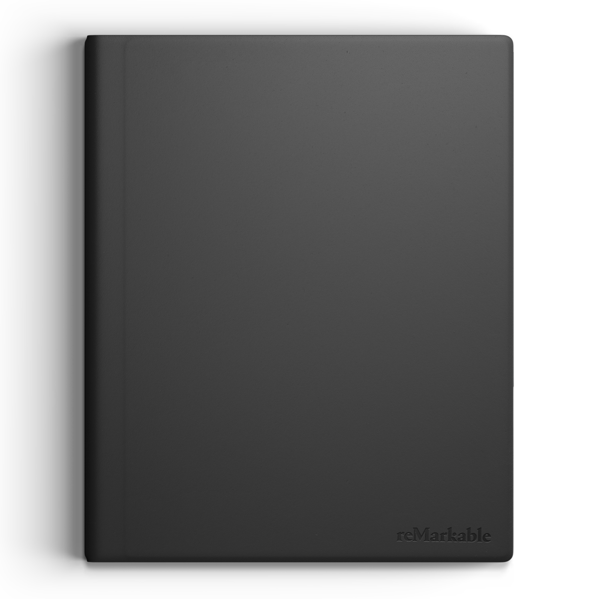 Ein geschlossenes, schwarzes Remarkable-Tablet liegt flach auf einer weißen Oberfläche, Draufsicht.