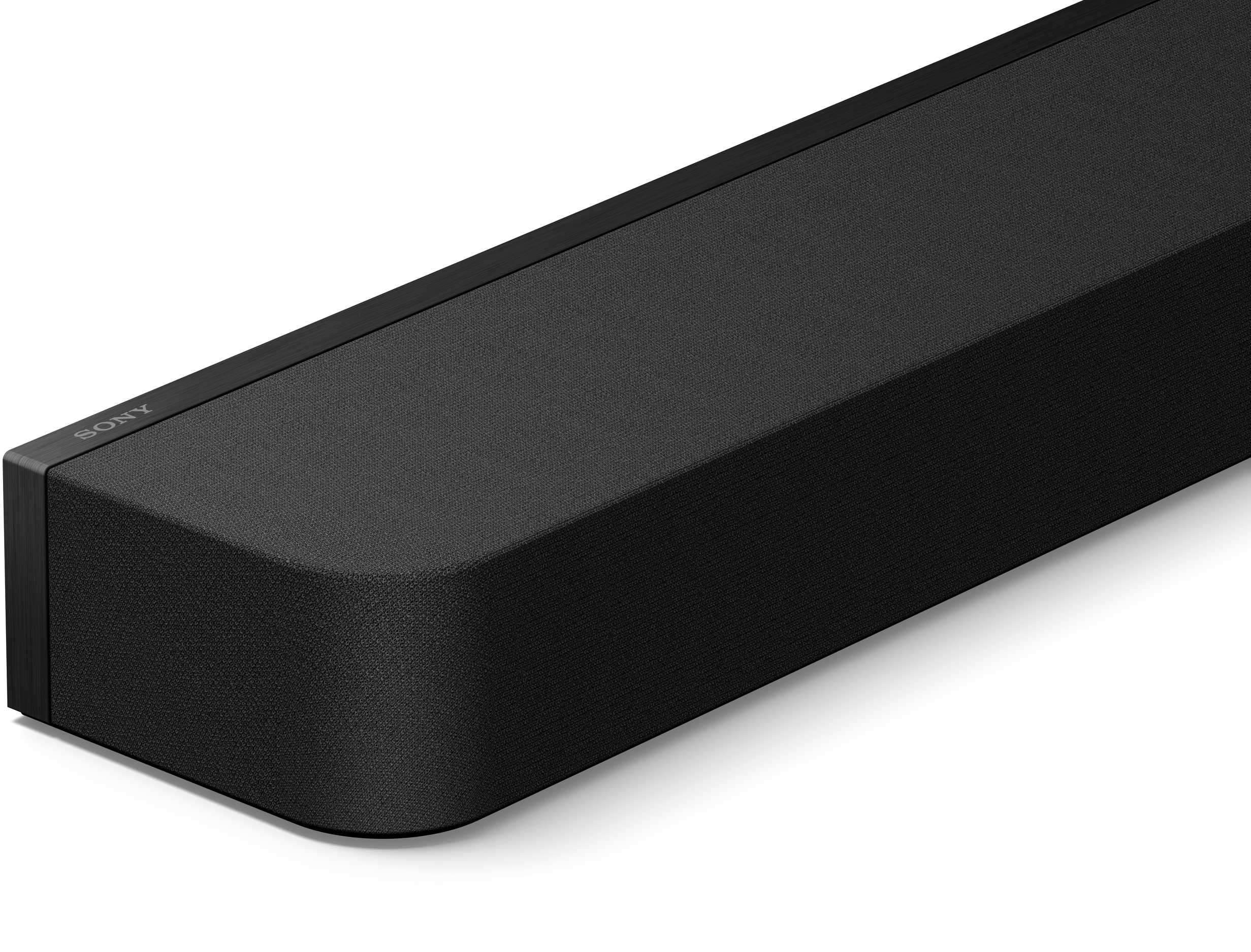 Fekete Sony soundbar, közelkép. Szövet borítás, Sony logóval az oldalon.