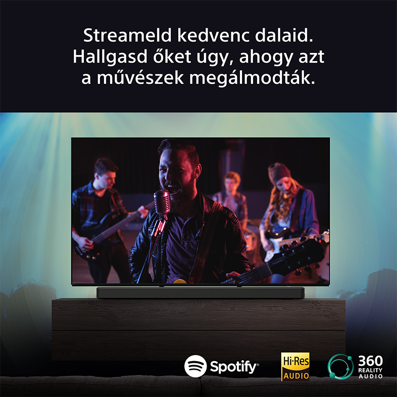 Egy TV, amelyen egy zenekar játszik, alatta egy soundbarral, és a Spotify logó.