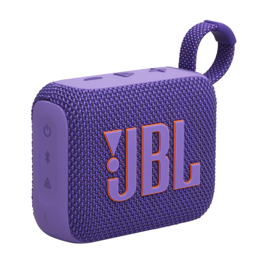 Üstünde kontroller, bir döngü ve JBL logosu bulunan mor bir JBL hoparlör. Hoparlör bir yüzeyde duruyor.