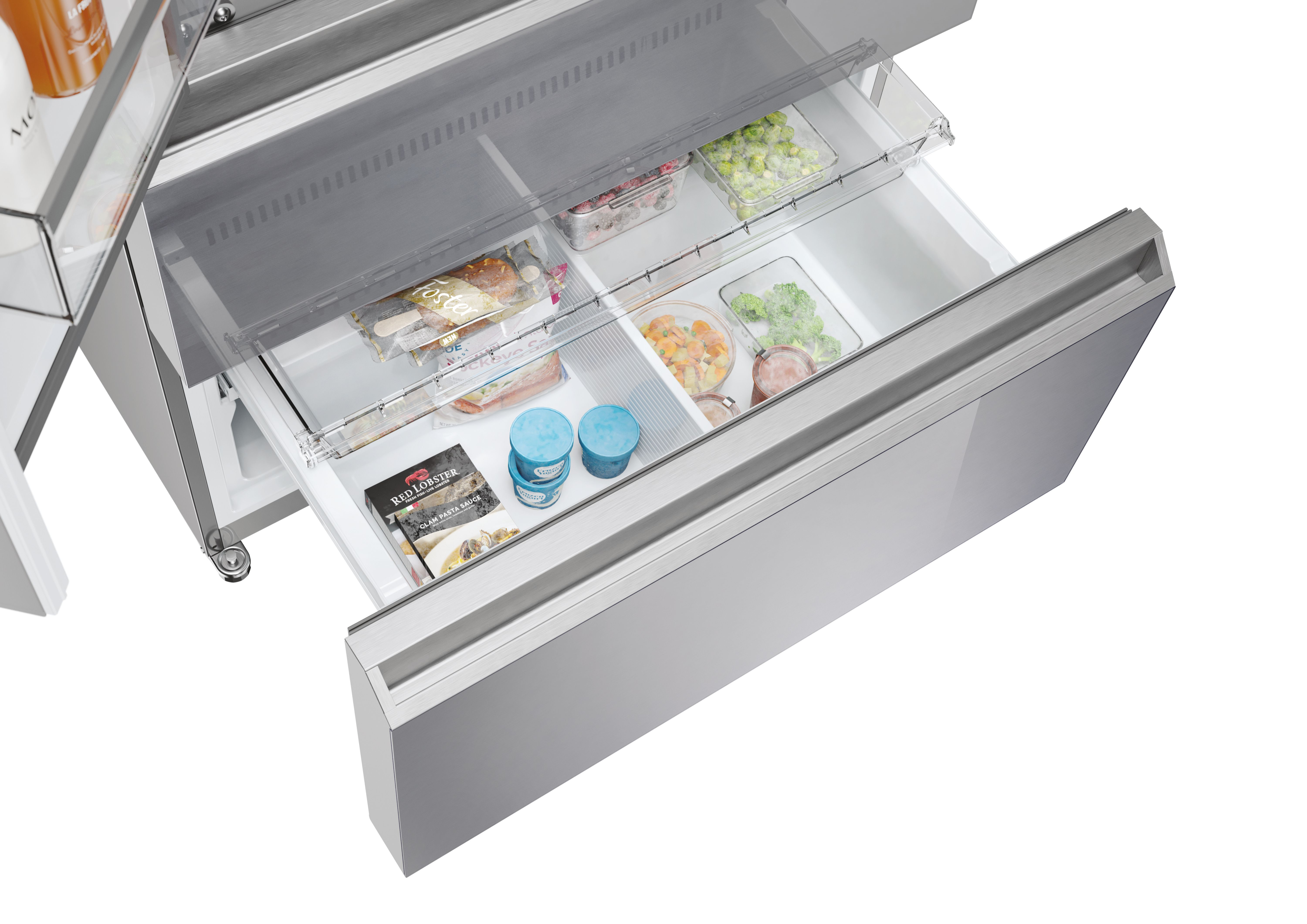Cajón de nevera abierto con varios alimentos. Interior blanco, exterior de acero inoxidable.