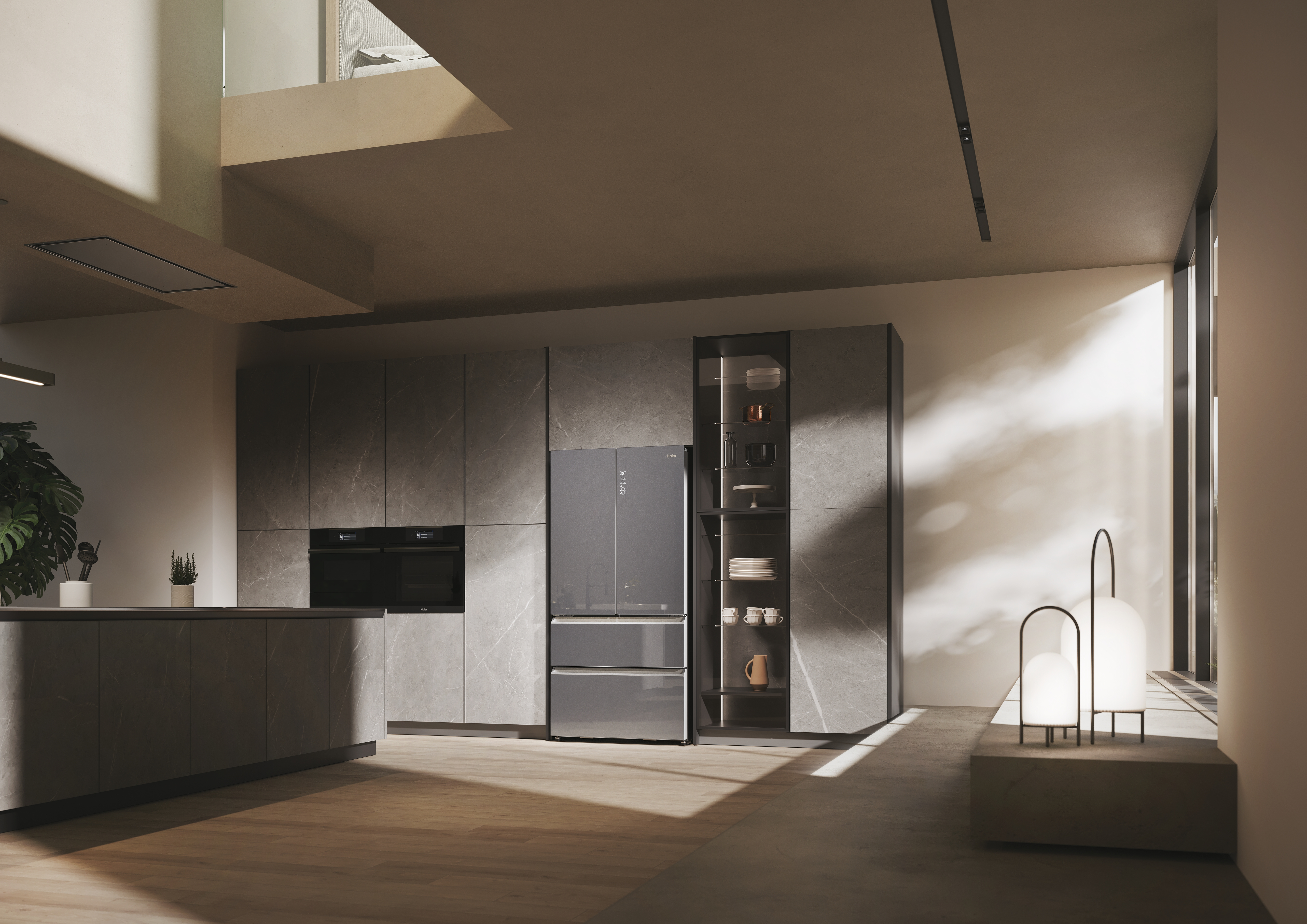 Una cocina moderna con gabinetes grises, electrodomésticos de acero inoxidable y una ventana grande.