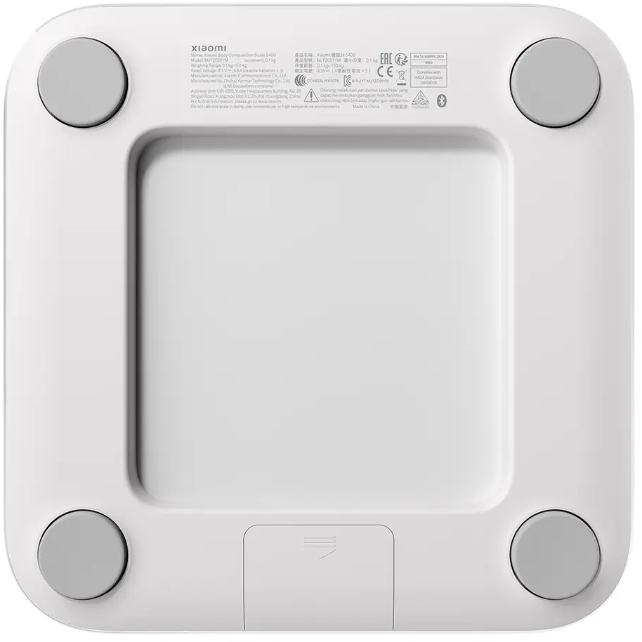 Vista inferiore di una bilancia intelligente Xiaomi bianca con quattro piedini grigi.