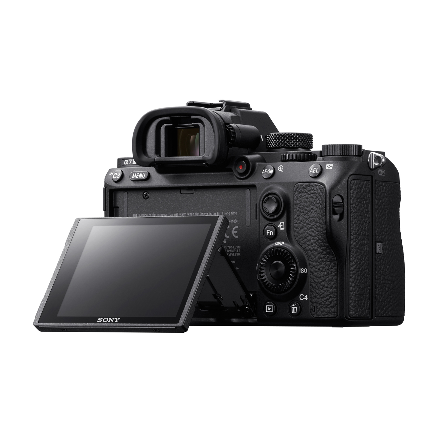 Fotocamera nera con schermo ribaltabile. Vista posteriore, sfondo bianco.