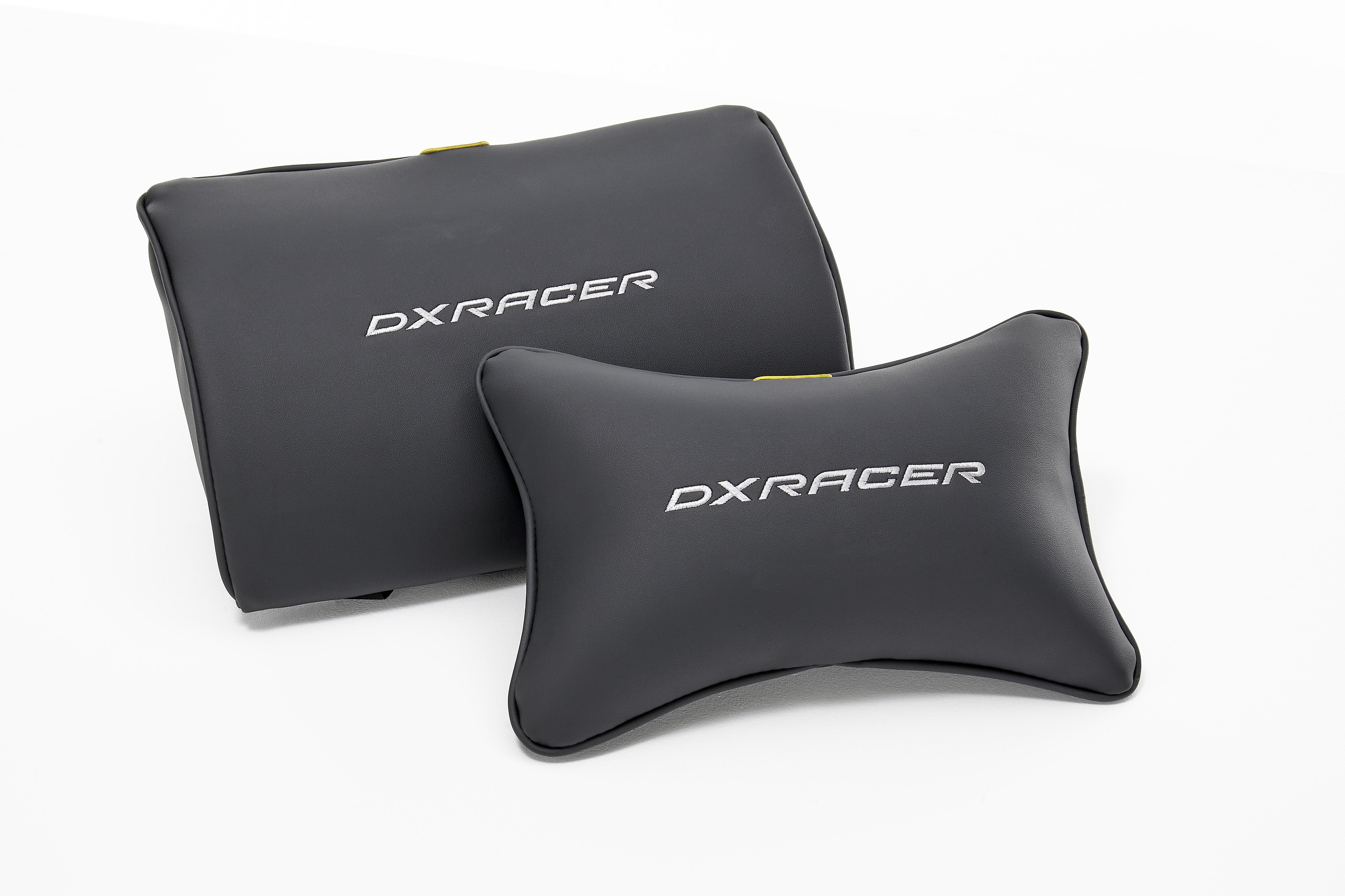 Zwei schwarze DXRACER-Kissen, eines rechteckig, eines gebogen, auf weißer Oberfläche.