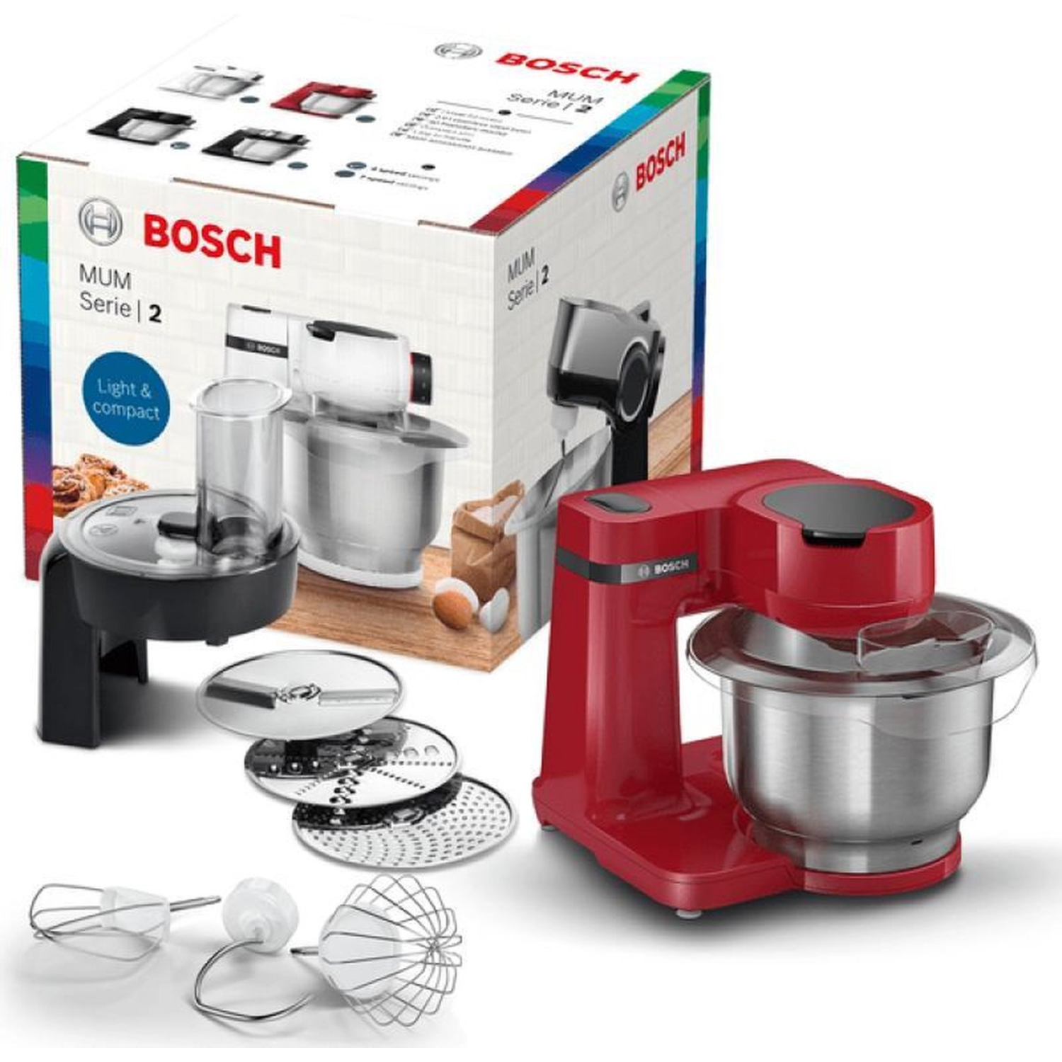 Een rode Bosch keukenmachine met accessoires, waaronder een doos, gardes en snijschijven. De doos toont het product.