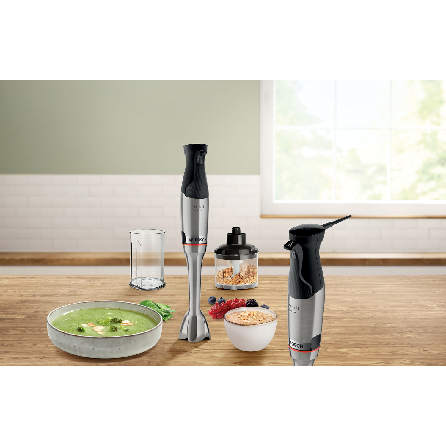 Bosch hand blender with accessories. Includes bowl and other items.