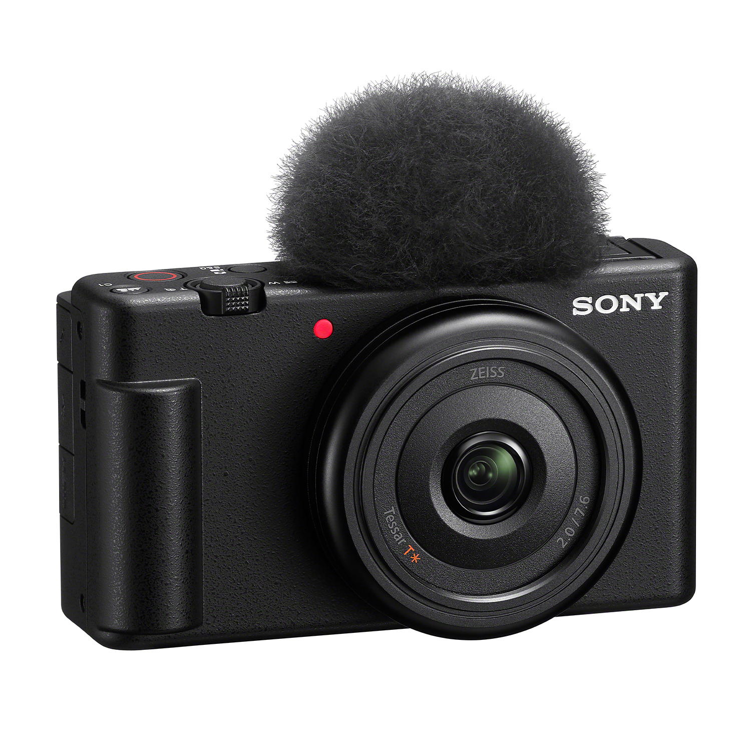 Fotocamera nera con microfono collegato, vista frontale.