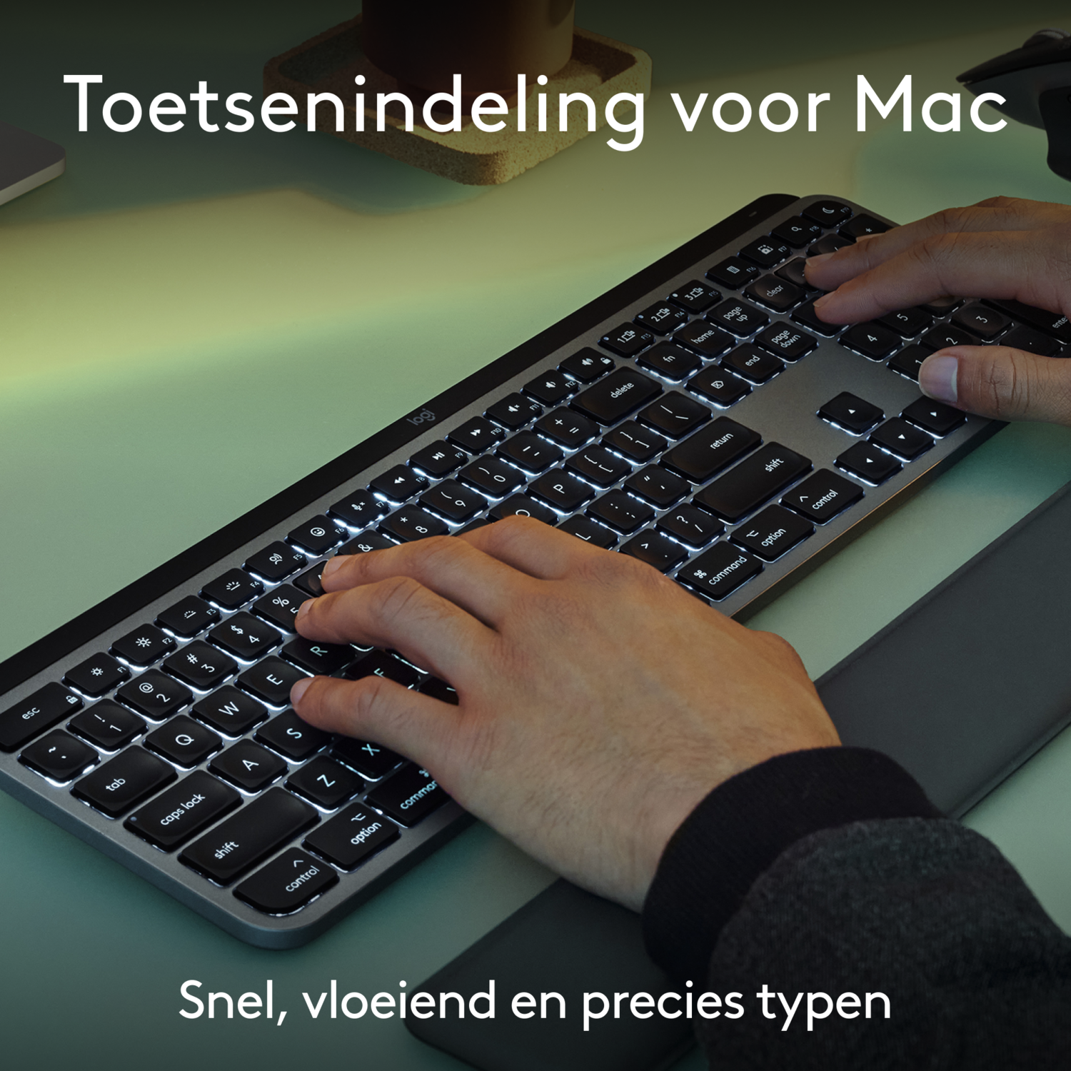 Hands typing on a backlit keyboard labeled as a Mac keyboard. Text reads: Fast, smooth, and precise typing.