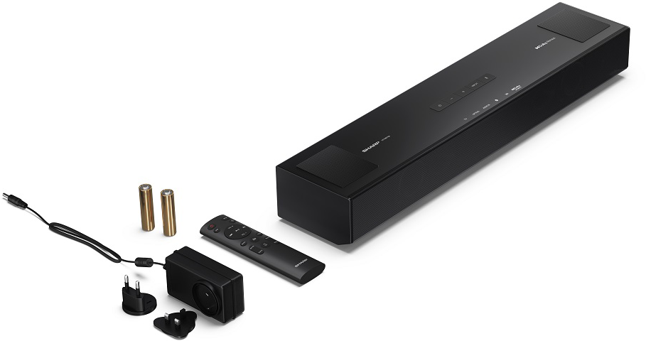 Fekete soundbar Dolby Digital-lal. Tartalmazza a távirányítót, a tápegységet és az elemeket.