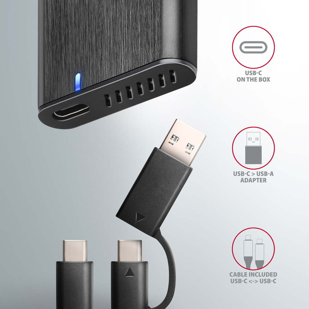 Fekete eszköz USB portokkal és USB-C - USB-A adapterrel.
